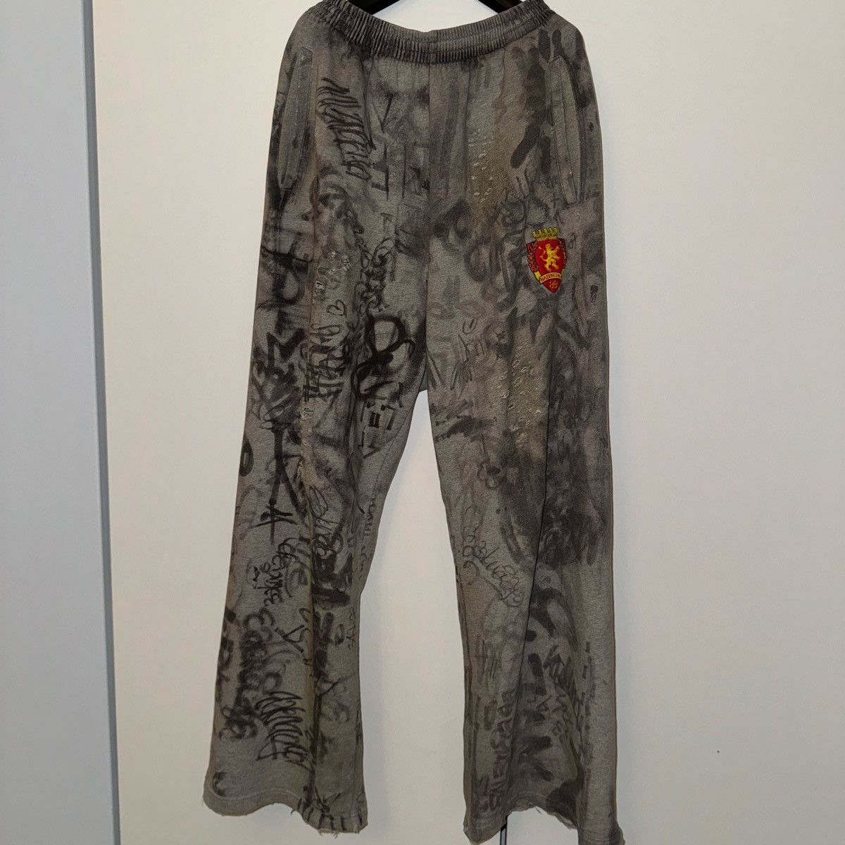 image of Balenciaga "graffiti Crest Cotton Track Pants" in Grey, Men's (Size 32)
