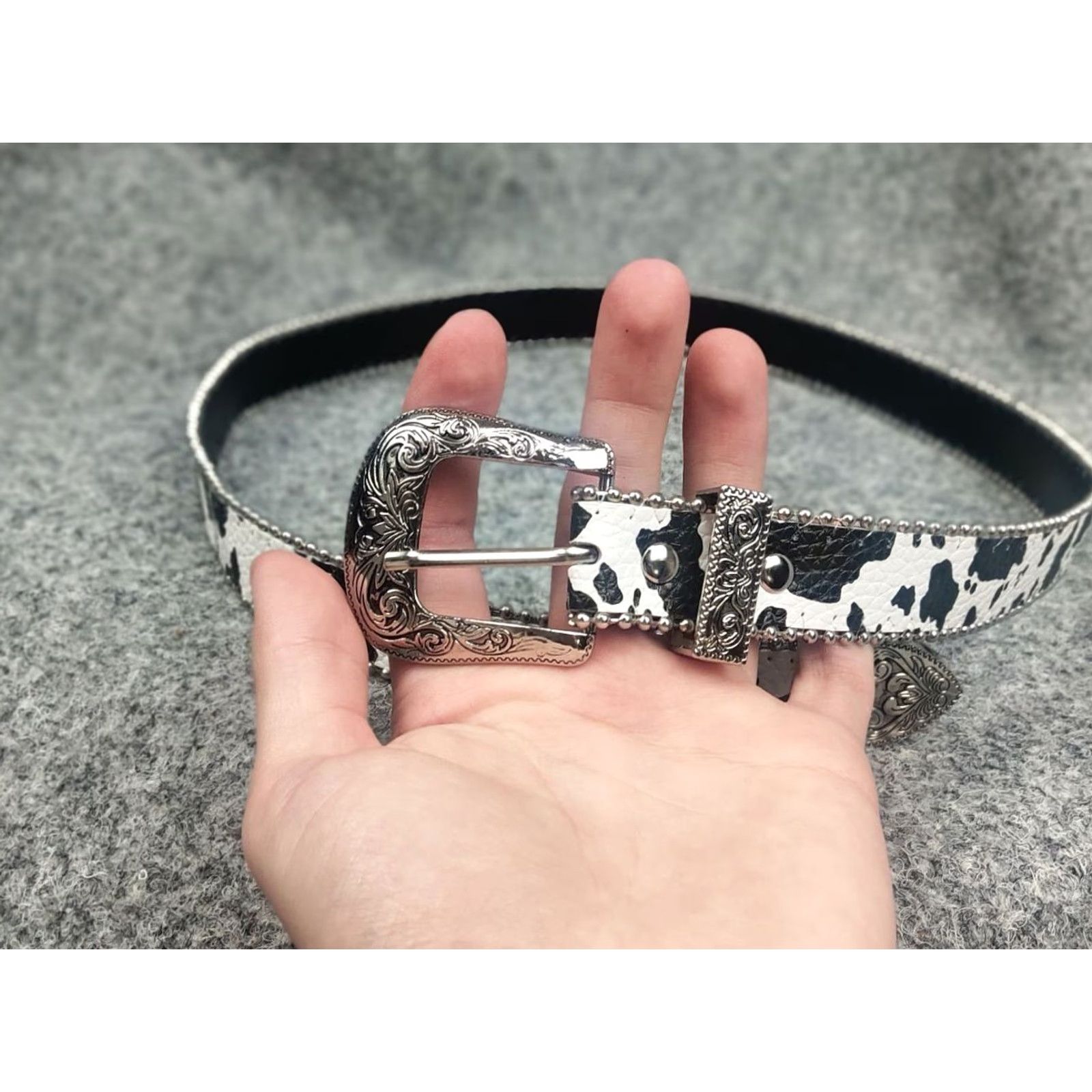Logo 7 VINTAGE Hysteric Japan style Y2K Metal Logo Black Cow Print Leather Belt Women One Size Adjustable Studded Pattern Animal Print 90s Logo Vintage Belt Size ONE SIZE - 2 Thumbnail