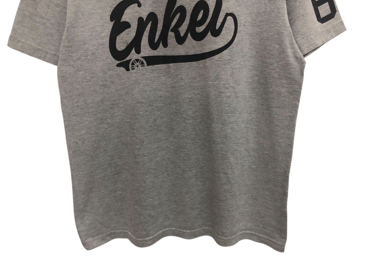 Japanese Brand × Sports Specialties ENKEI RPF1 #67 RACING PERFORMANCE WHEELS JDM STYLE PROMO TEE Size US L / EU 52-54 / 3 - 4 Thumbnail