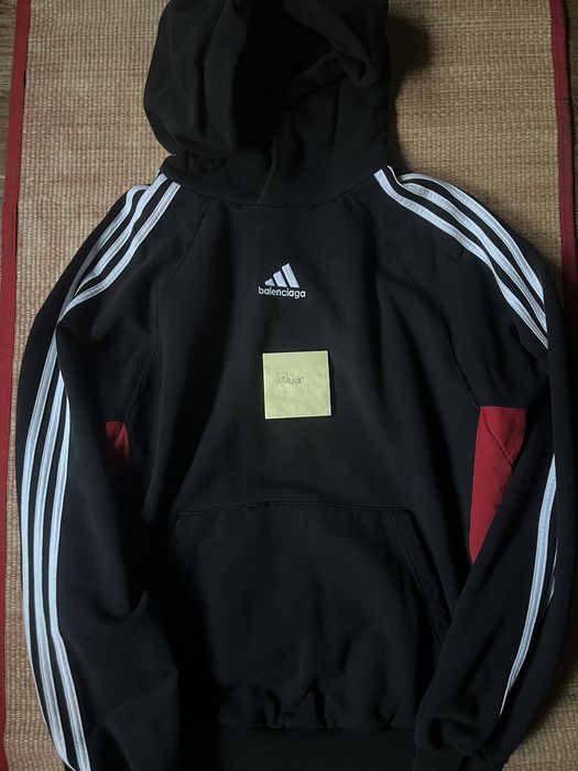 Red adidas hoodie with cheap black stripes