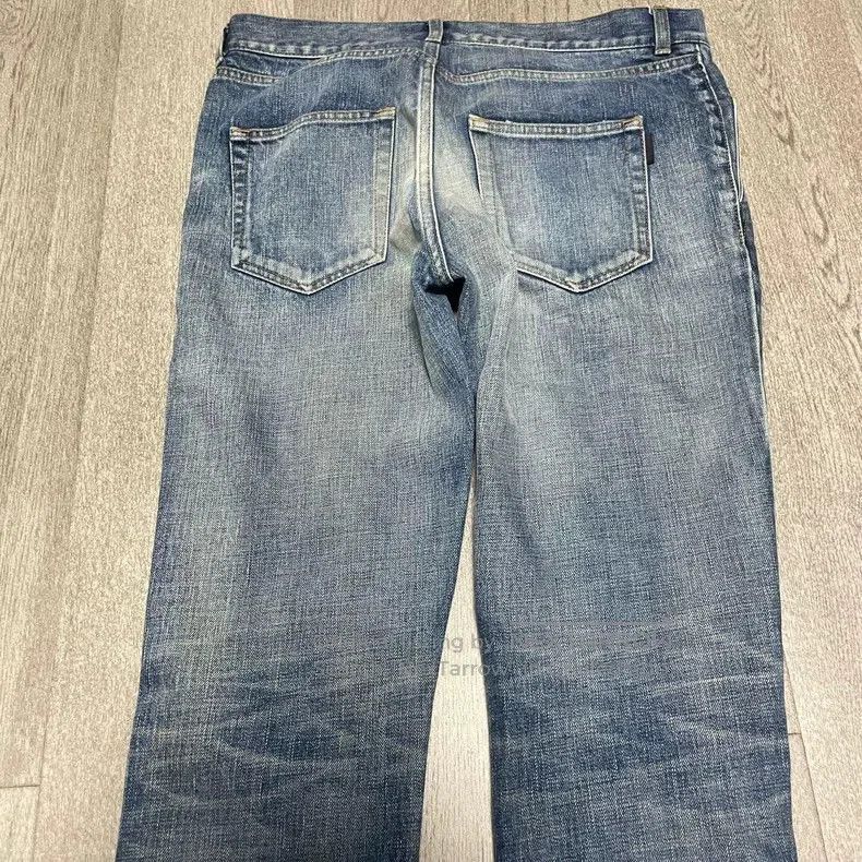 Saint Laurent D02 Distressed Blue Jeans.