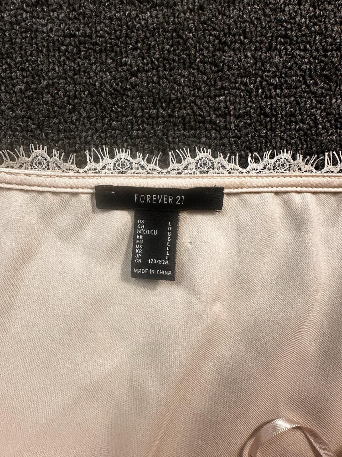 Forever 21 Forever 21 Beige Lace Trim Spaghetti Strap Bodysuit Size L Size ONE SIZE - 6 Thumbnail
