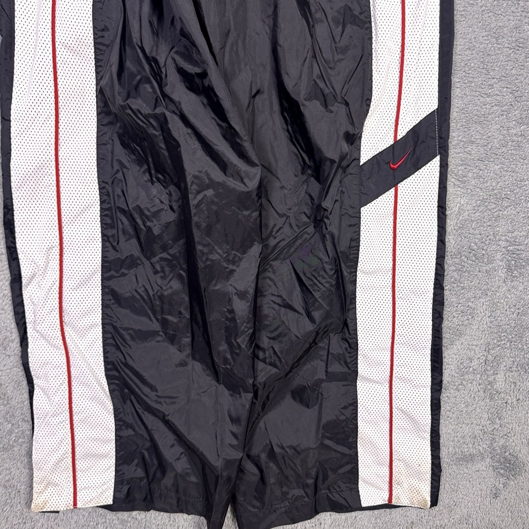 Nike Keywords: "90s Track Pants," "Vintage Nike," "2XL," "Warmup Sweatpant," "Baggy," "Tearaway," "Black" directly address the item’S style and size Size US 39 - 2 Thumbnail