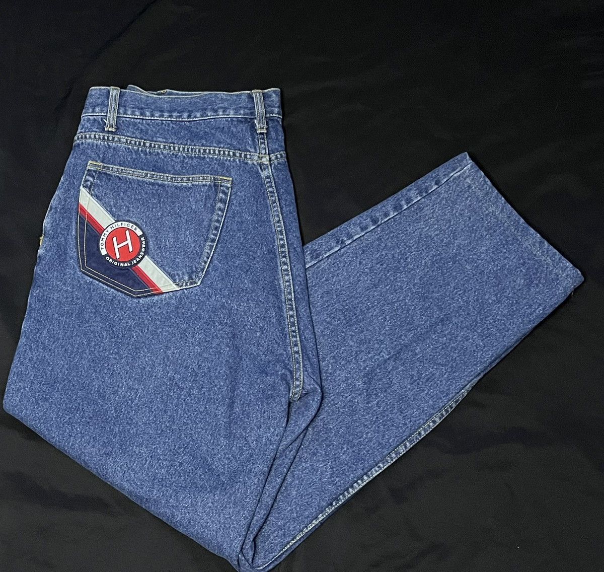 image of Vintage Baggy Tommy Hilfiger Embroidered Logos Denim Jeans in Blue, Men's (Size 38)