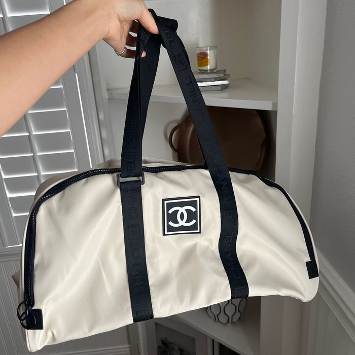 Most popular tags for this image include: chanel duffle/gym bag