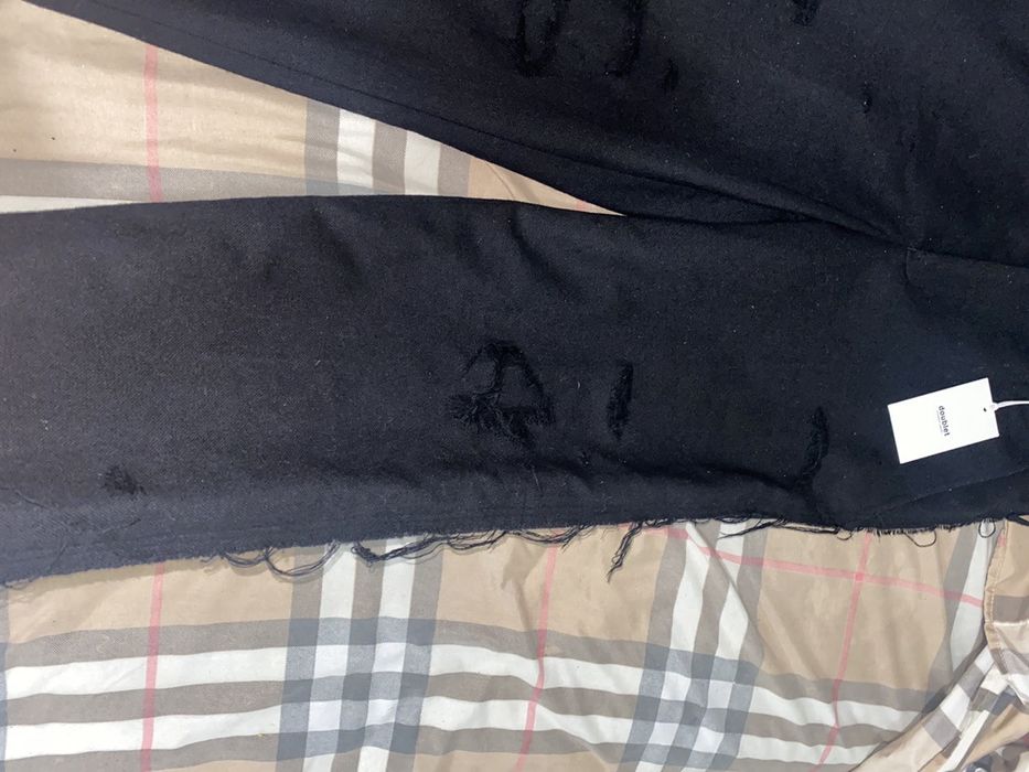 Doublet Recycled wool damaged trousers | Grailed