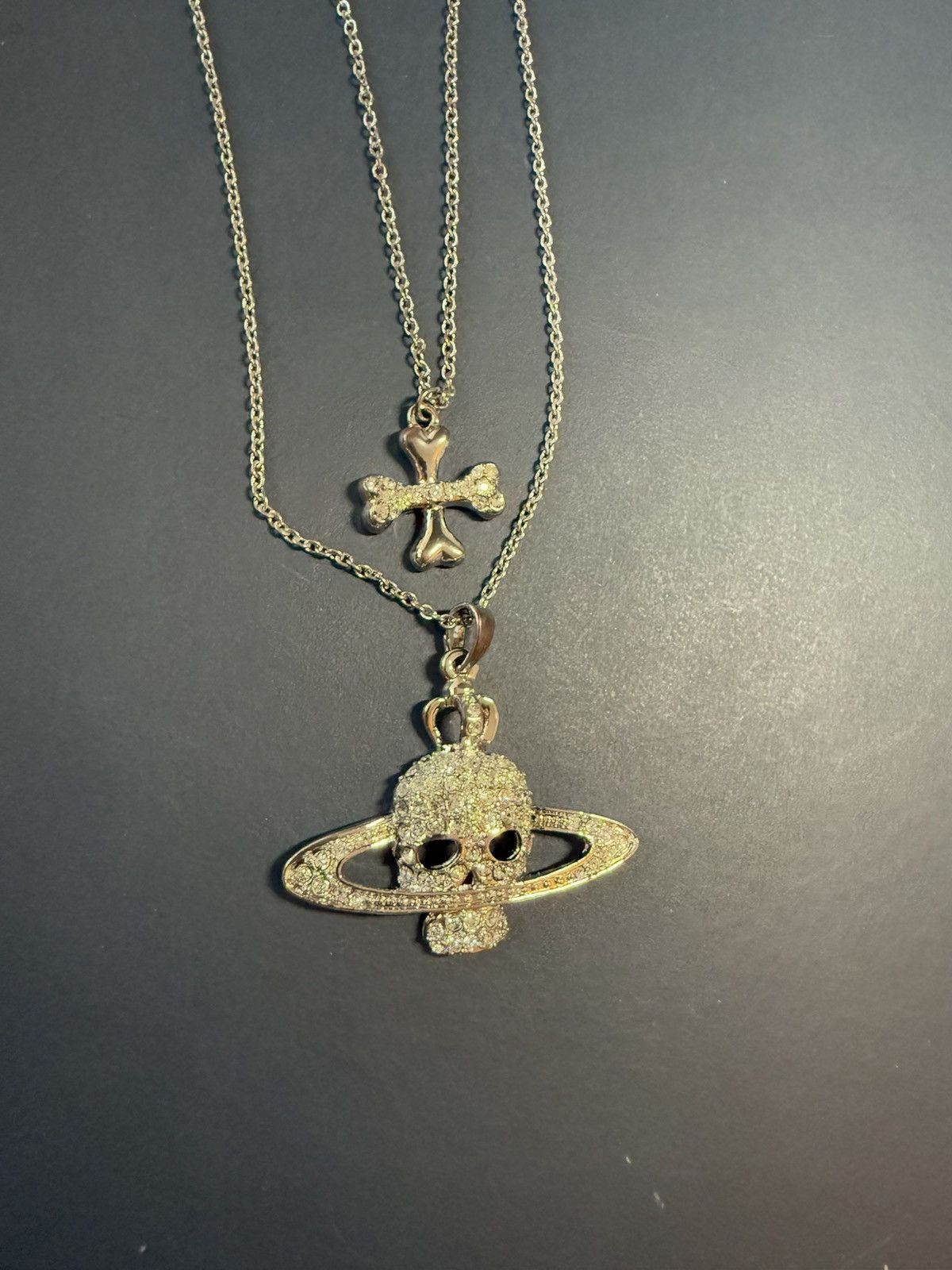 Vivienne westwood skull and crossbones necklace hotsell
