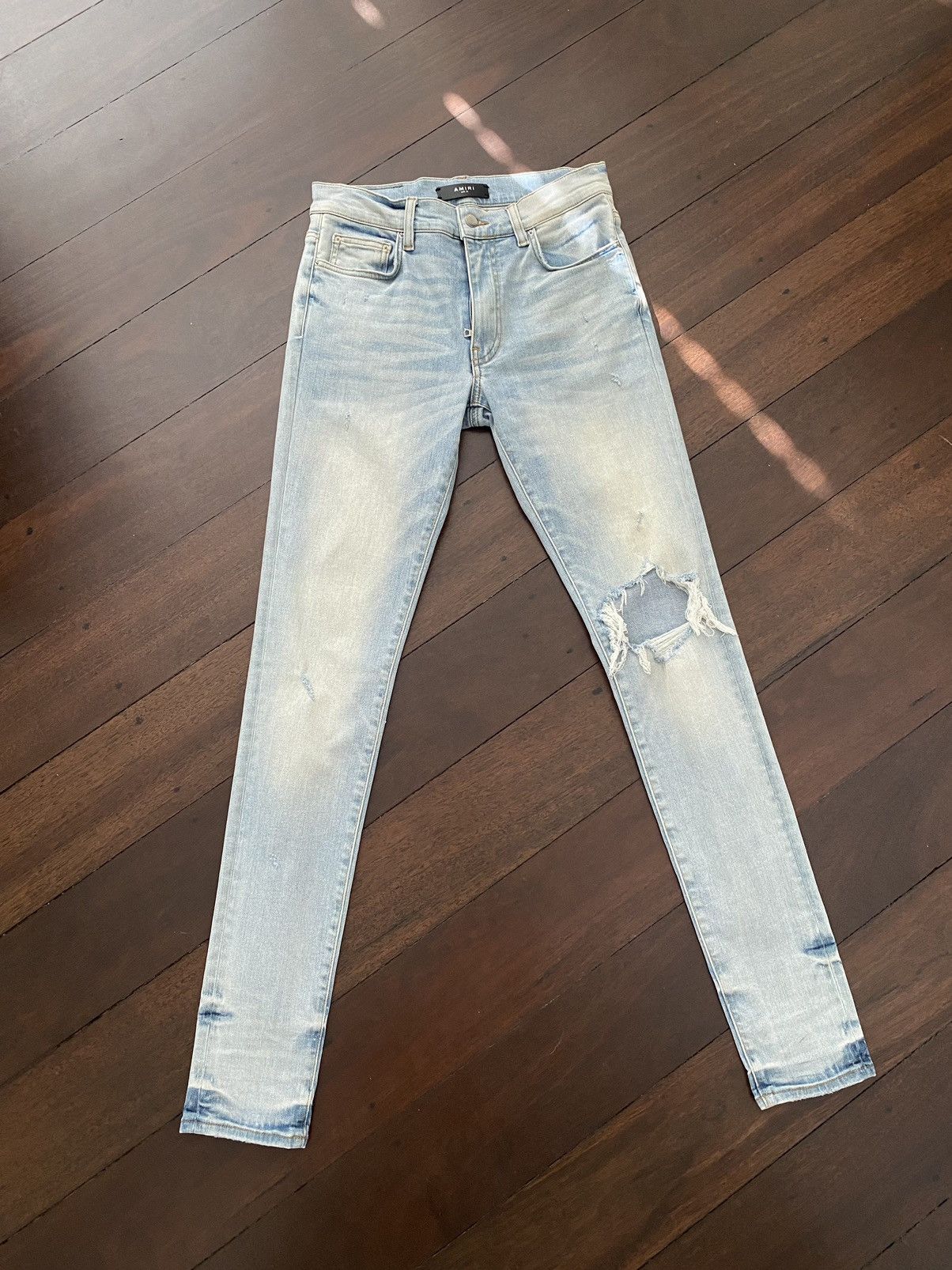 image of Amiri “Broken Denim” - Super Light Indigo (Size 31) in Blue, Men's