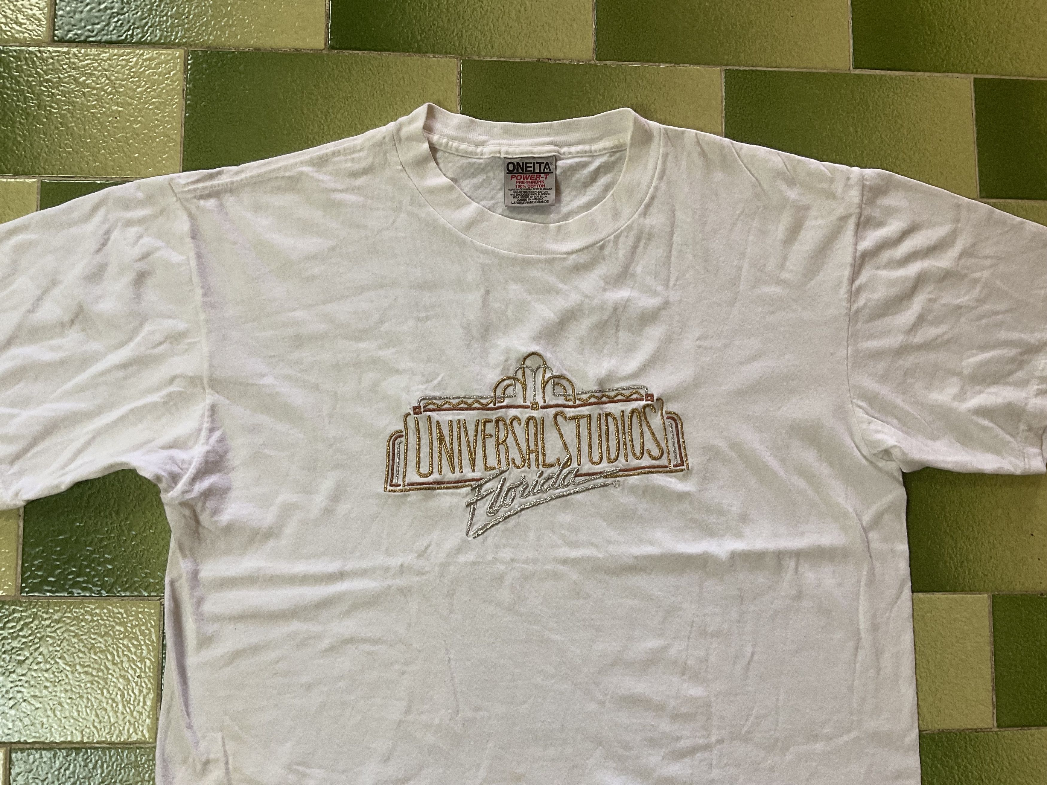 Vintage 90s Stitched Gold & Silver Universal Florida Tee Menswear