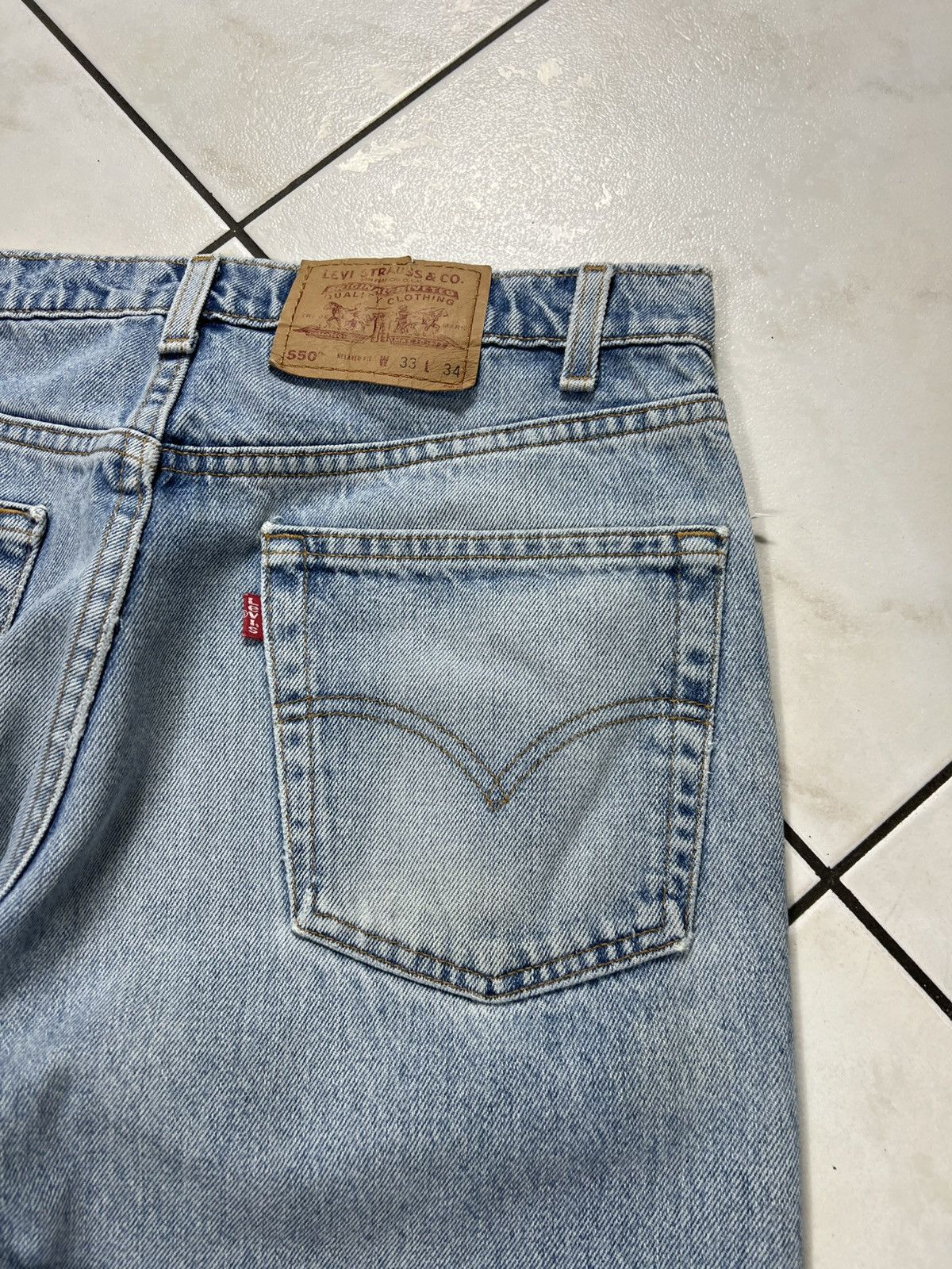 Levi's Vintage 90s Levi’s 550 light blue washed distressed jeans Size US 33 - 18 Thumbnail