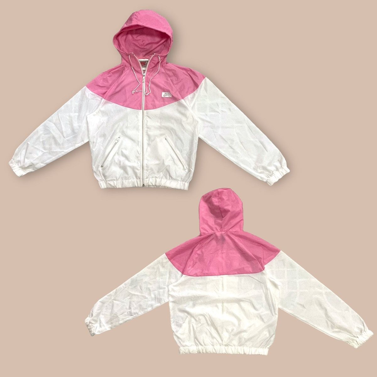 Light pink and white nike windbreaker best sale