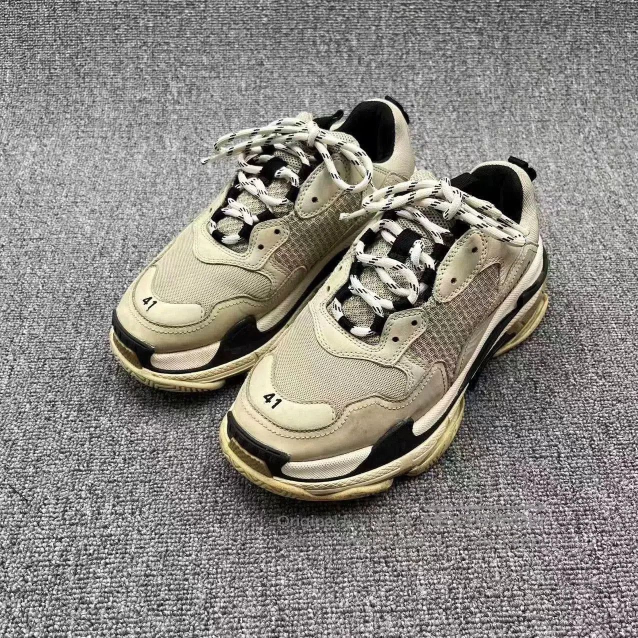balenciaga triple s retro dad sneakers.