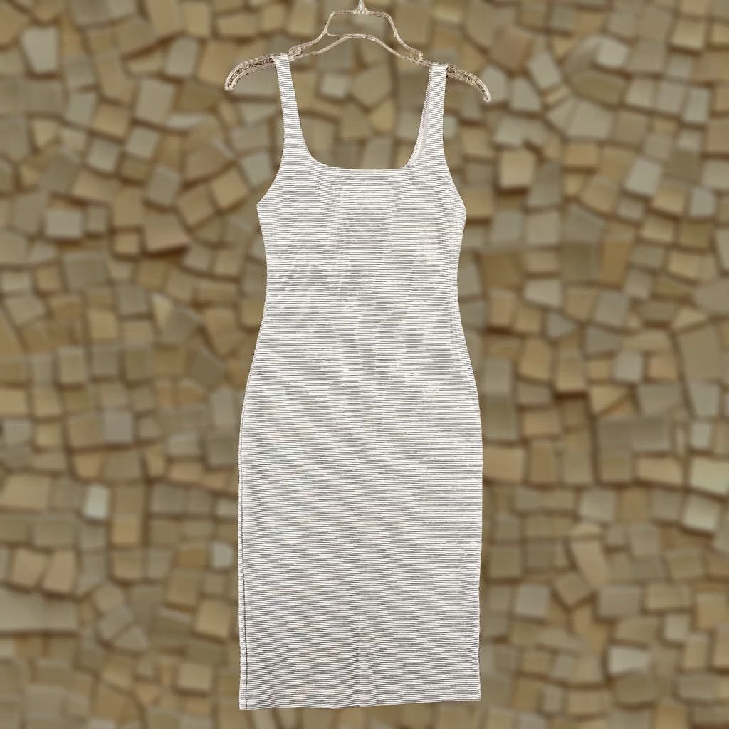 zara knit dress with buttons ZARA JEWEL CUT OUT KNIT DRESS Round neck, sleeveless dress. Featuring a  front cut-out detail and jewel embellishments. Hem with side slit