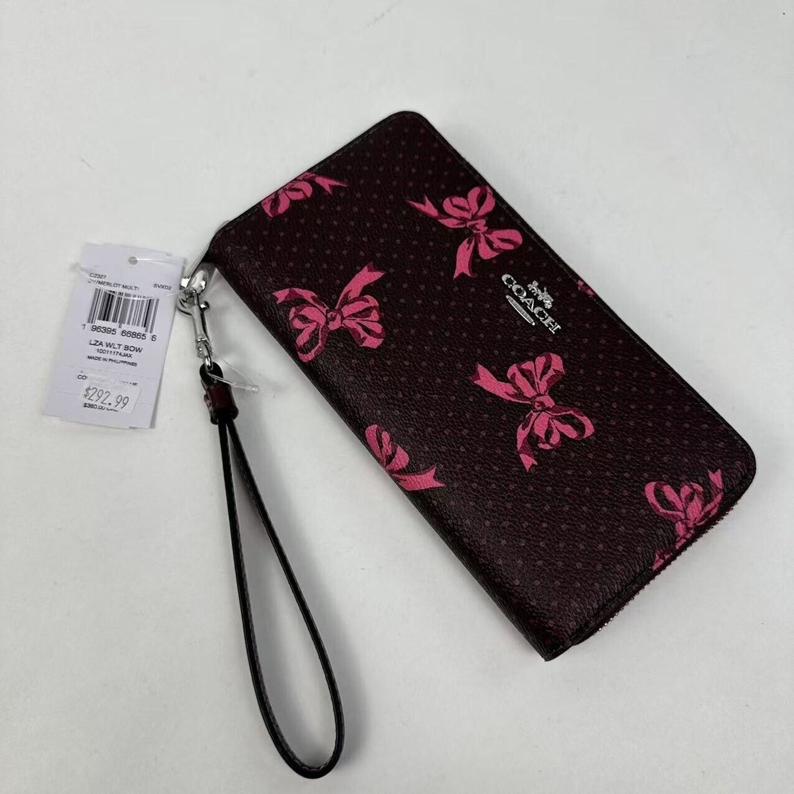 Coach Coach Long Zip Around Wallet Signature Canvas Bow Print Size ONE SIZE - 1 Thumbnail