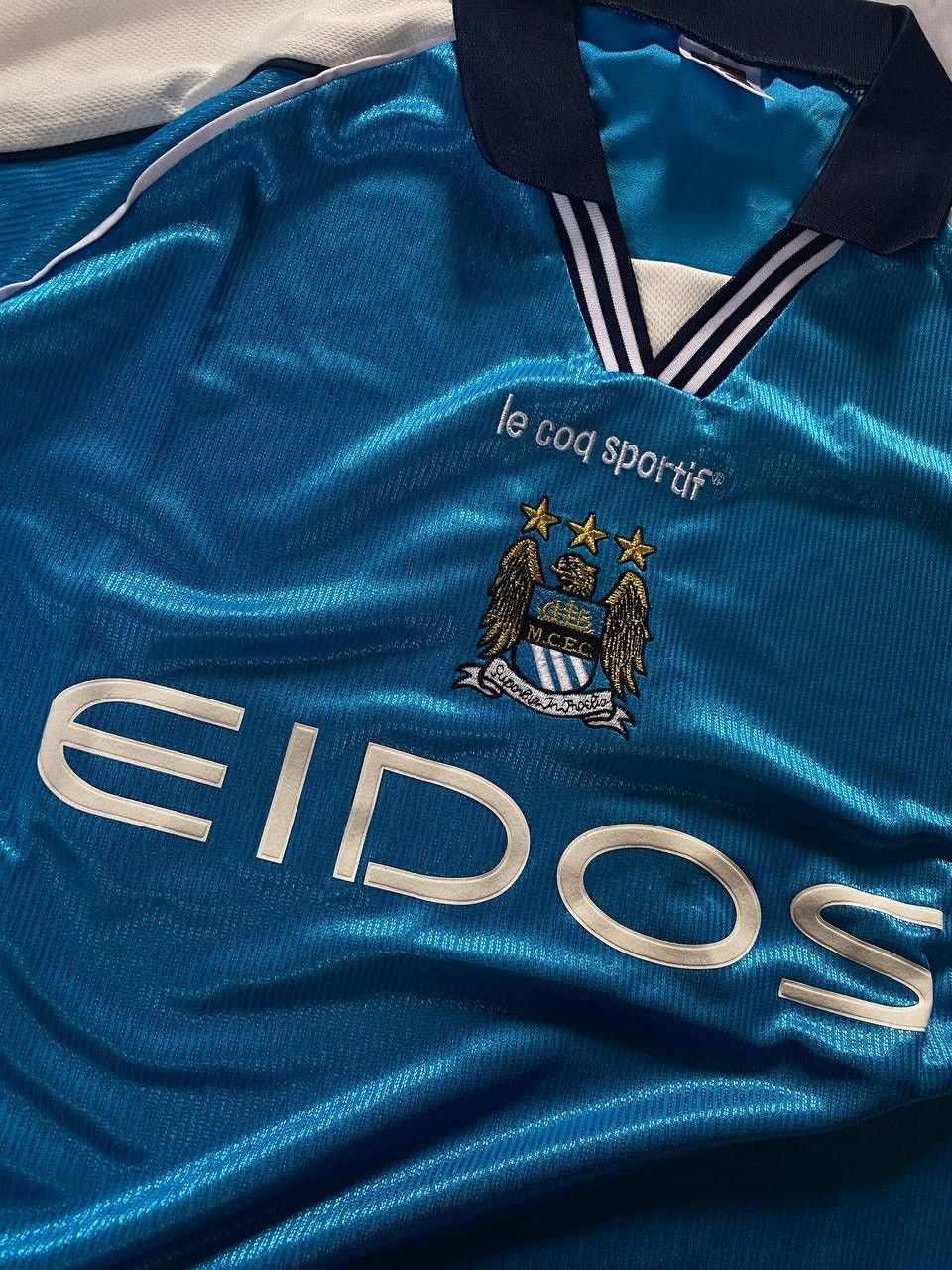 Le Coq Sportif × Vintage Vintage Le Coq Sportif Manchester City 1999-2001 Home Jersey Size US L / EU 52-54 / 3 - 4 Thumbnail