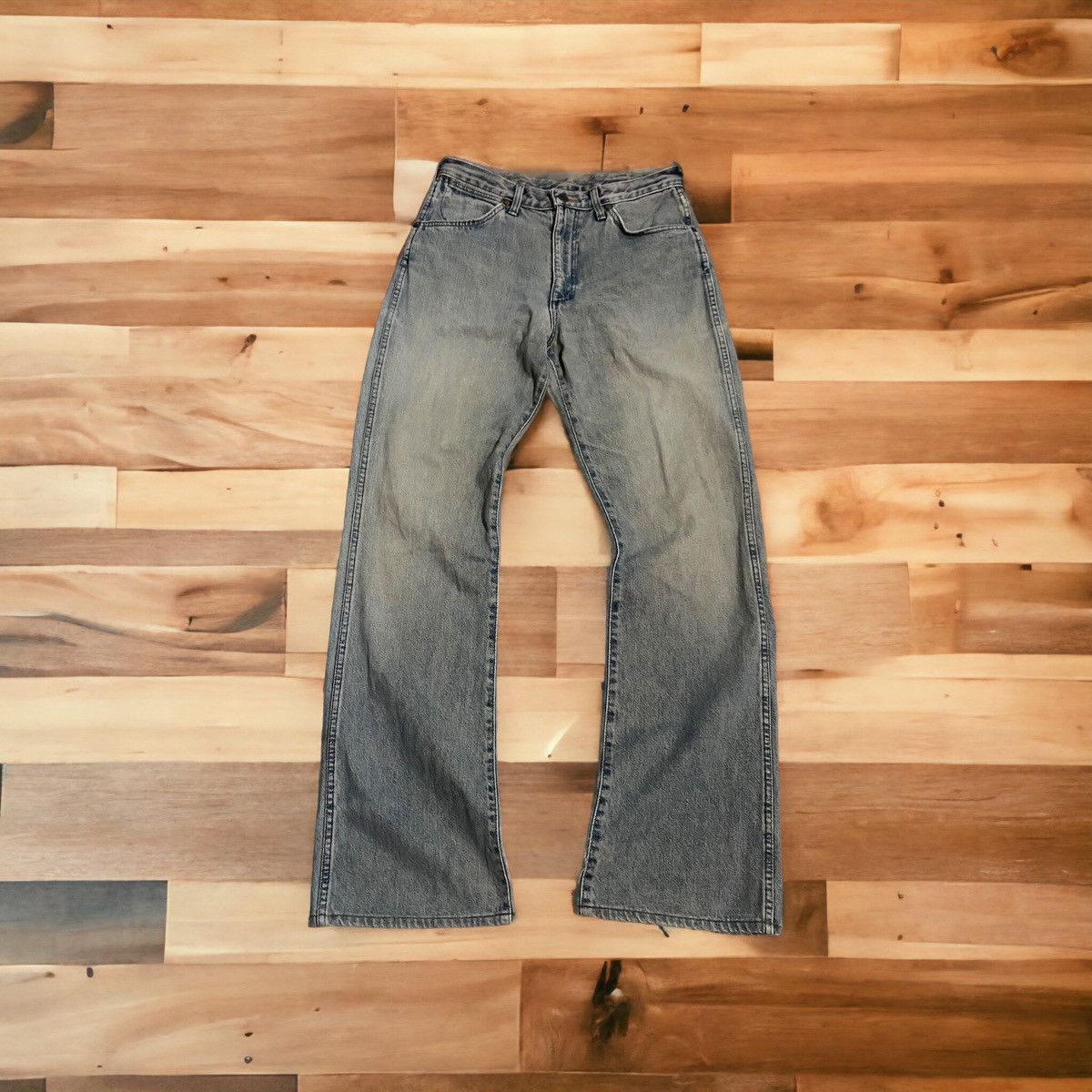 image of Vintage Wrangler Bootcut Distressed Faded Denim in Blue, Men's (Size 31)