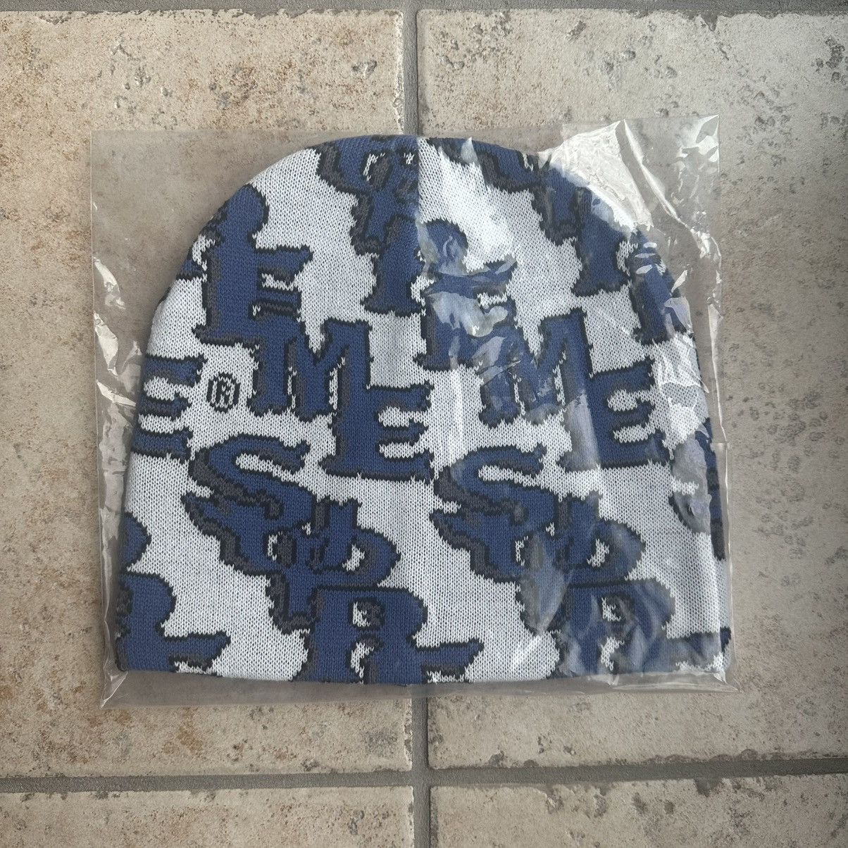Supreme SUPREME TAG BEANIE BY ART DEALER | Grailed