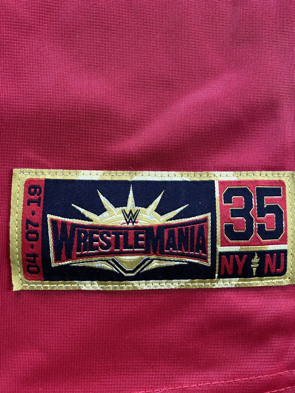 WWE 2019 WWE Wresltlemania 35 NY NJ Football Style Jersey Size US L / EU 52-54 / 3 - 12 Thumbnail