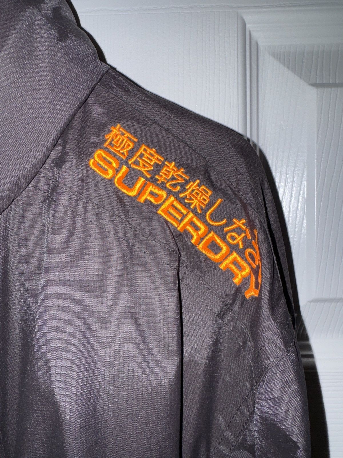 Superdry Superdry Men’s Windbreaker JacketBlack with Orange Logo (XL) Size US XL / EU 56 / 4 - 2 Thumbnail