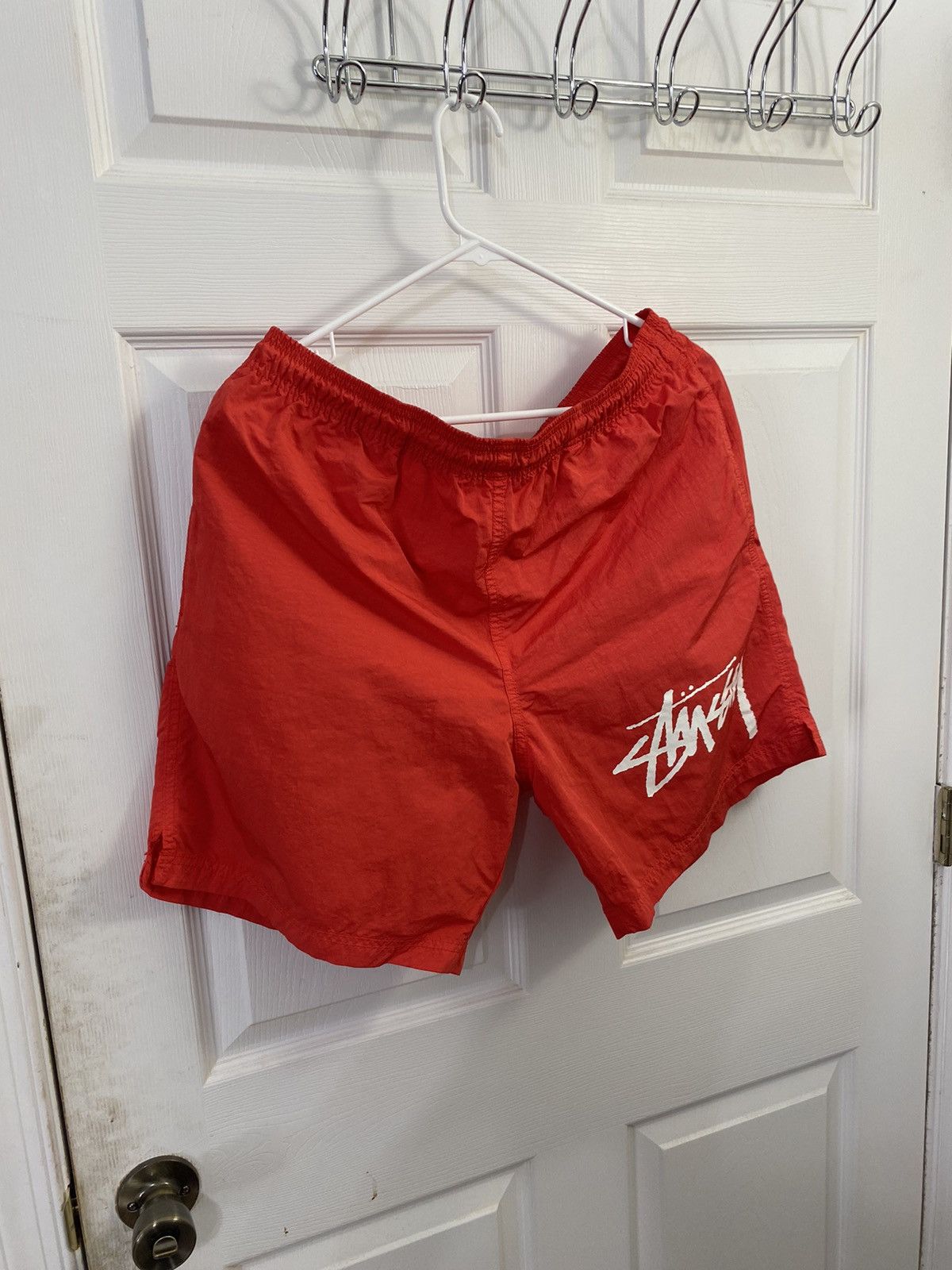 Nike Nike x Stussy shorts red | Grailed