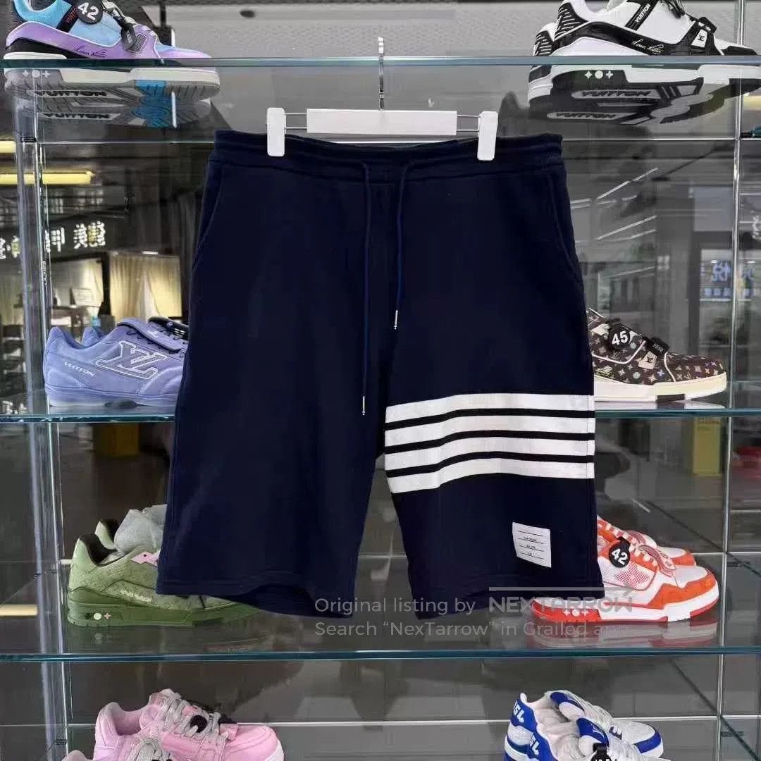 Thom Browne Classic Four-Bar Stripe Shorts.