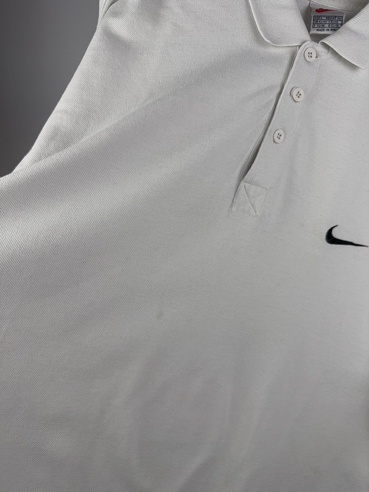 Nike × Vintage Vintage 90s Nike White Polo Shirt Swoosh Logo Made in Peru Size US L / EU 52-54 / 3 - 3 Thumbnail