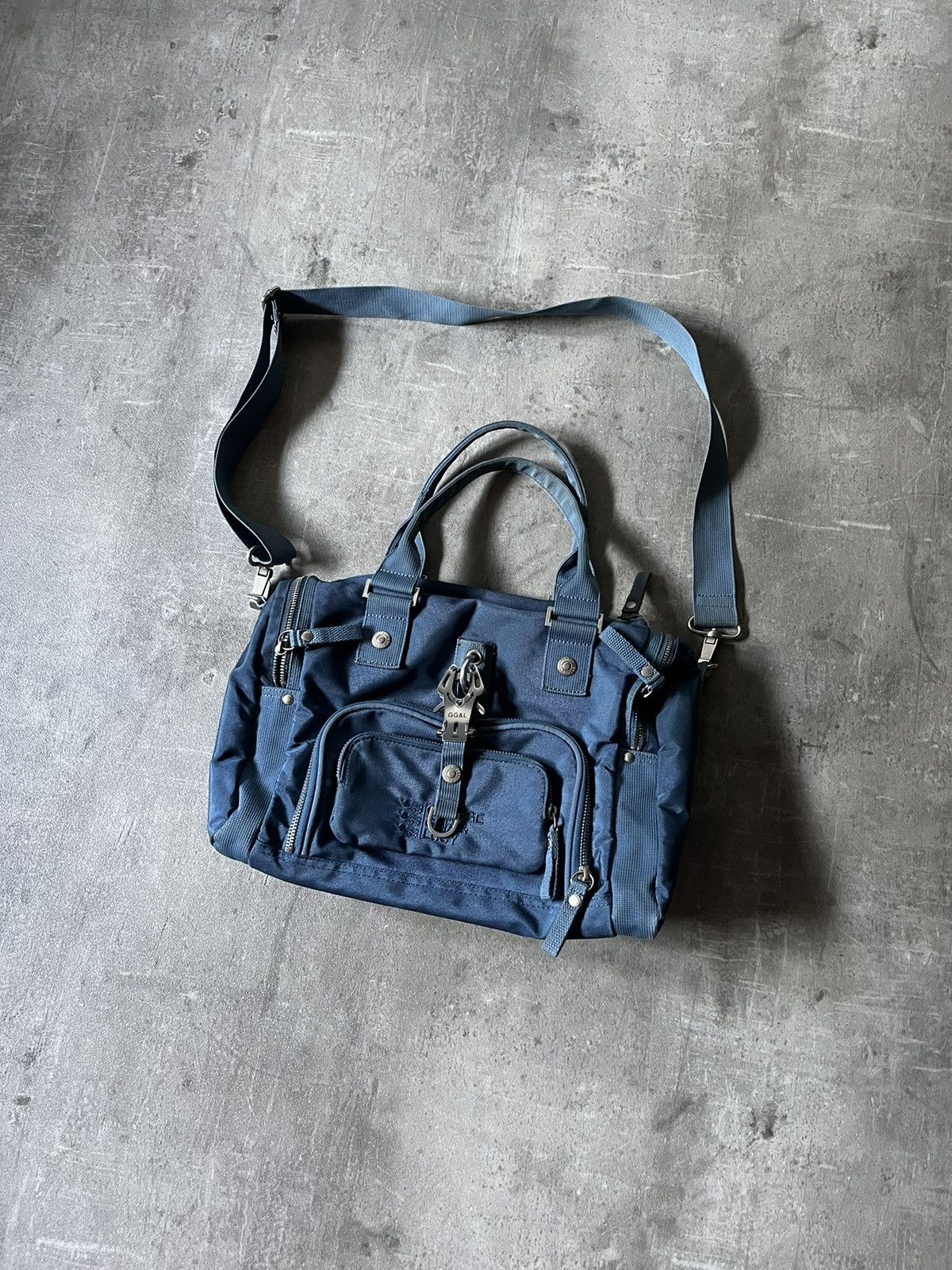 George Gina & Lucy store blue bag