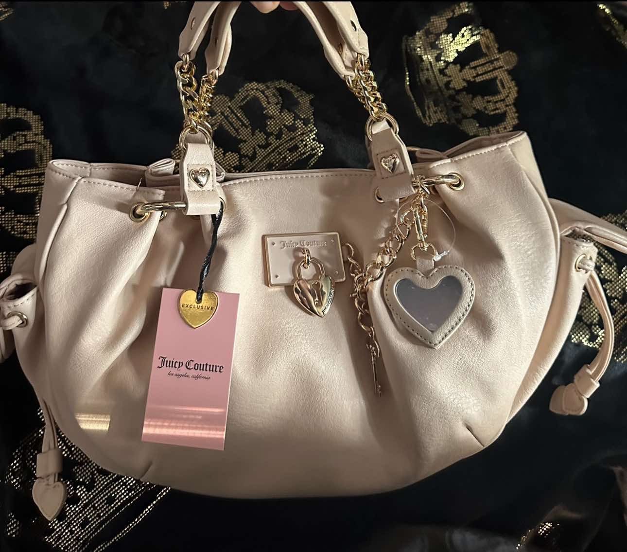 Juicy Couture Juicy Couture Rolling On dumpling satchel Size ONE SIZE - 1 Thumbnail