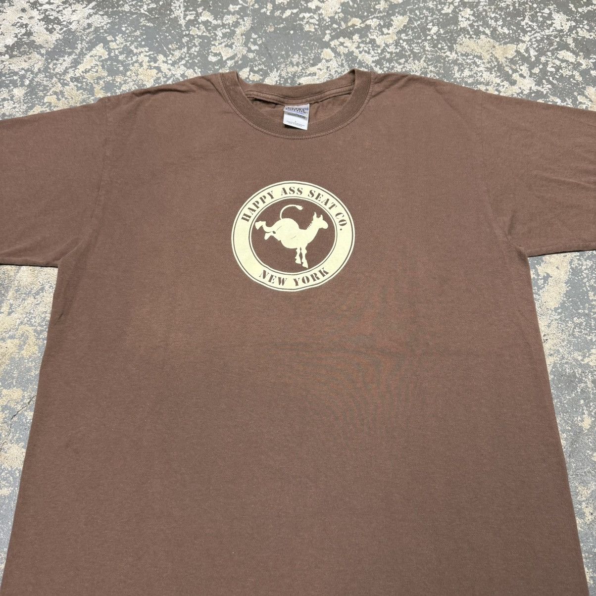 Vintage Vintage Happy Ass Seat Co. Brown New York Tshirt Size US L / EU 52-54 / 3 - 9 Thumbnail