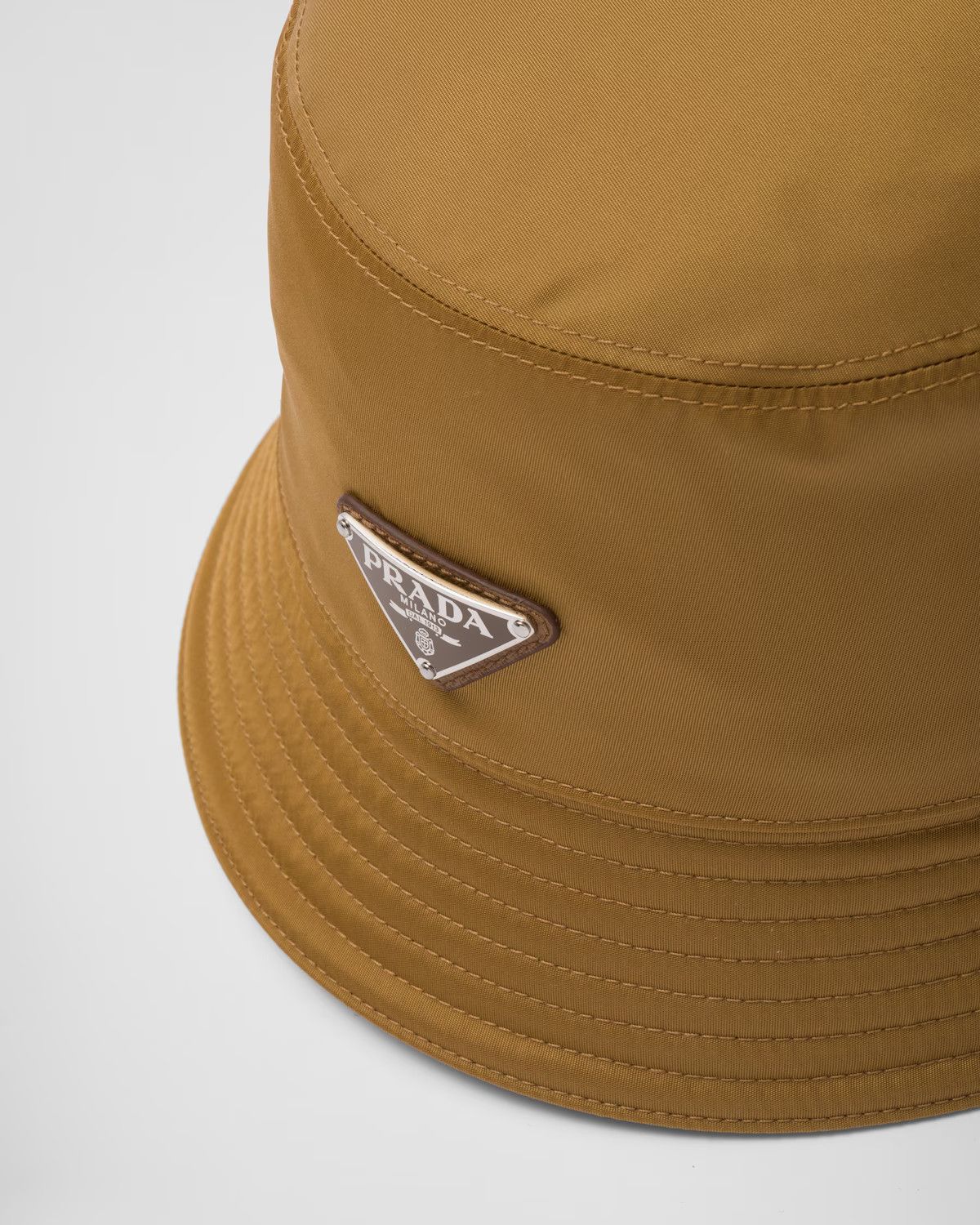 PRADA BUCKET HAT TRIANGLE LOGO CAP 2HC137_2DMI_F0005 - Main Image