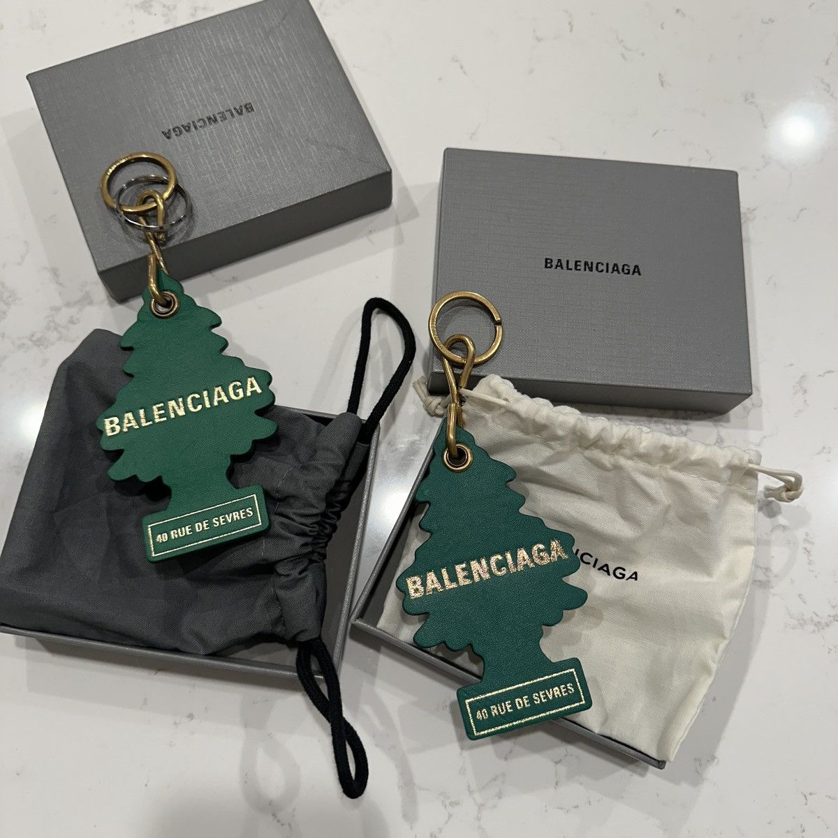 image of Balenciaga ‘18 Bb Air Freshener Leather Keychain in Green, Men's