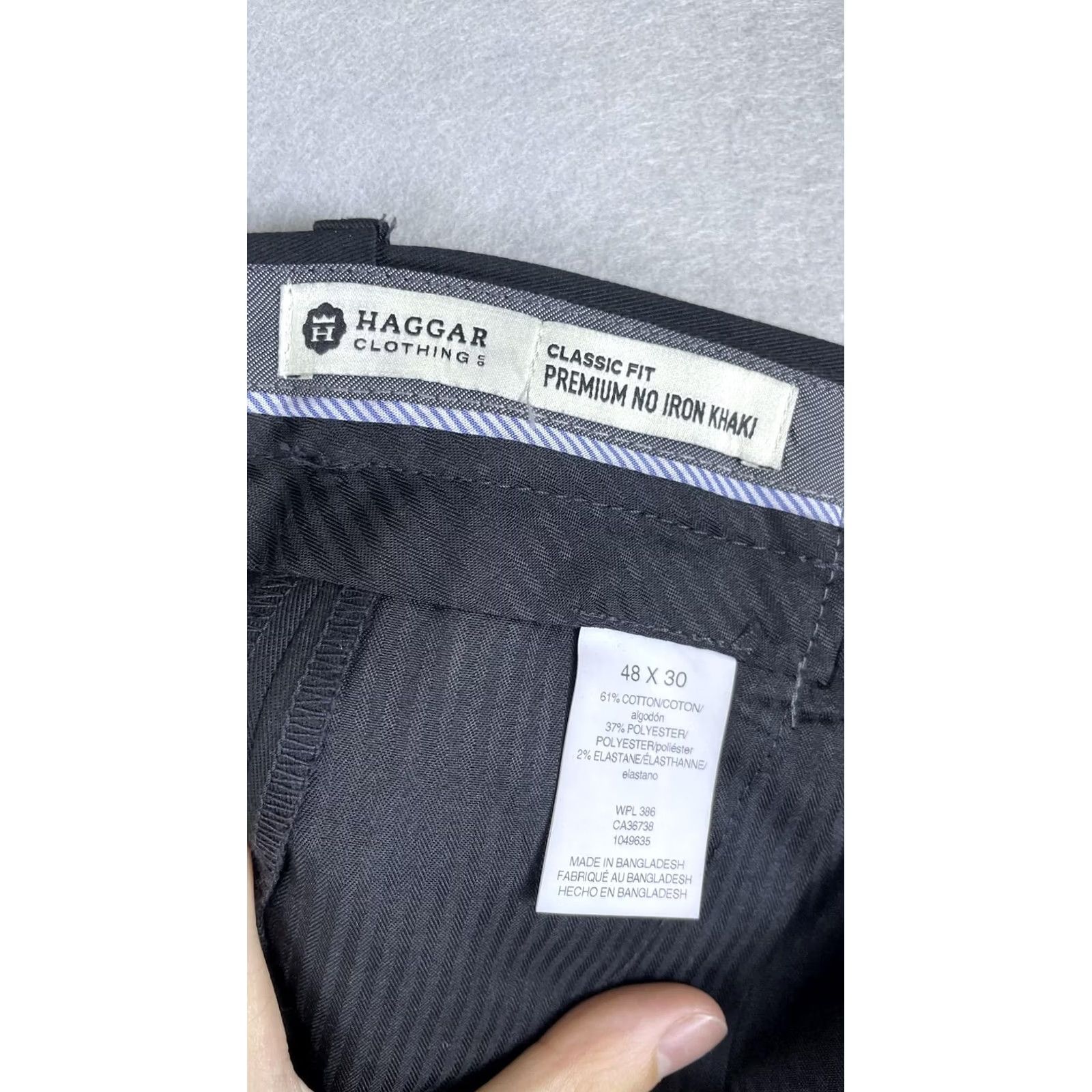 Haggar Haggar Pants Mens 48x30 Black Premium No Iron Khaki Classic Fit Pleated Big Tall Pants Mens 48 Big & Tall Black Knots? Size US 32 / EU 48 - 3 Thumbnail