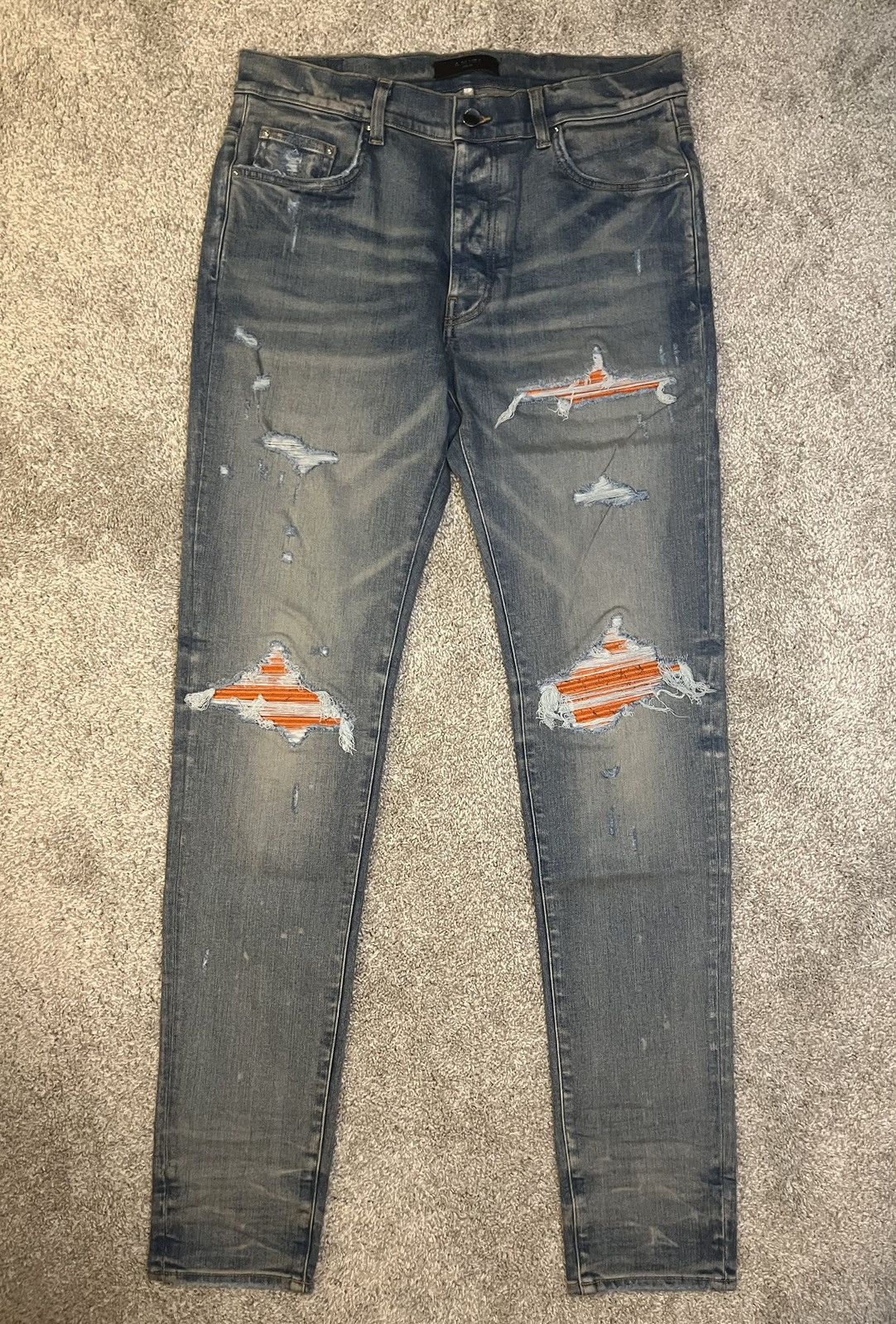 image of Amiri Mx1 Cracked Paint Jeans in Orange, Men's (Size 38)