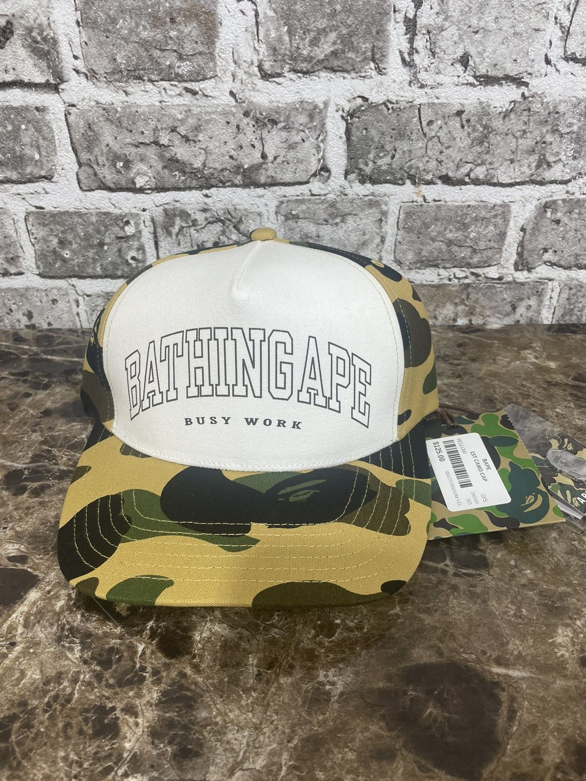 image of Bape 1St Camo Cap Yellow in Yellow Camo, Men's