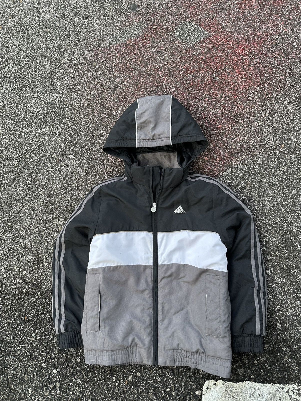 Image of Adidas Three Striped Light Puffer Jacket (Kids) in Black (Size Small)