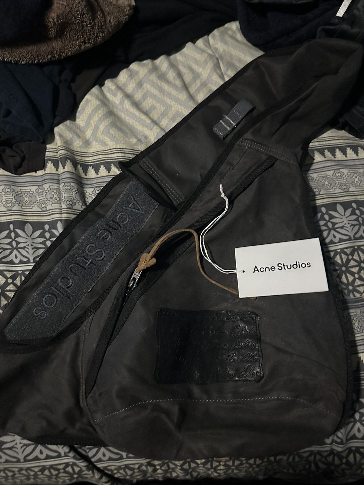 image of Acne Studios Sling Backpack in Black, Men's