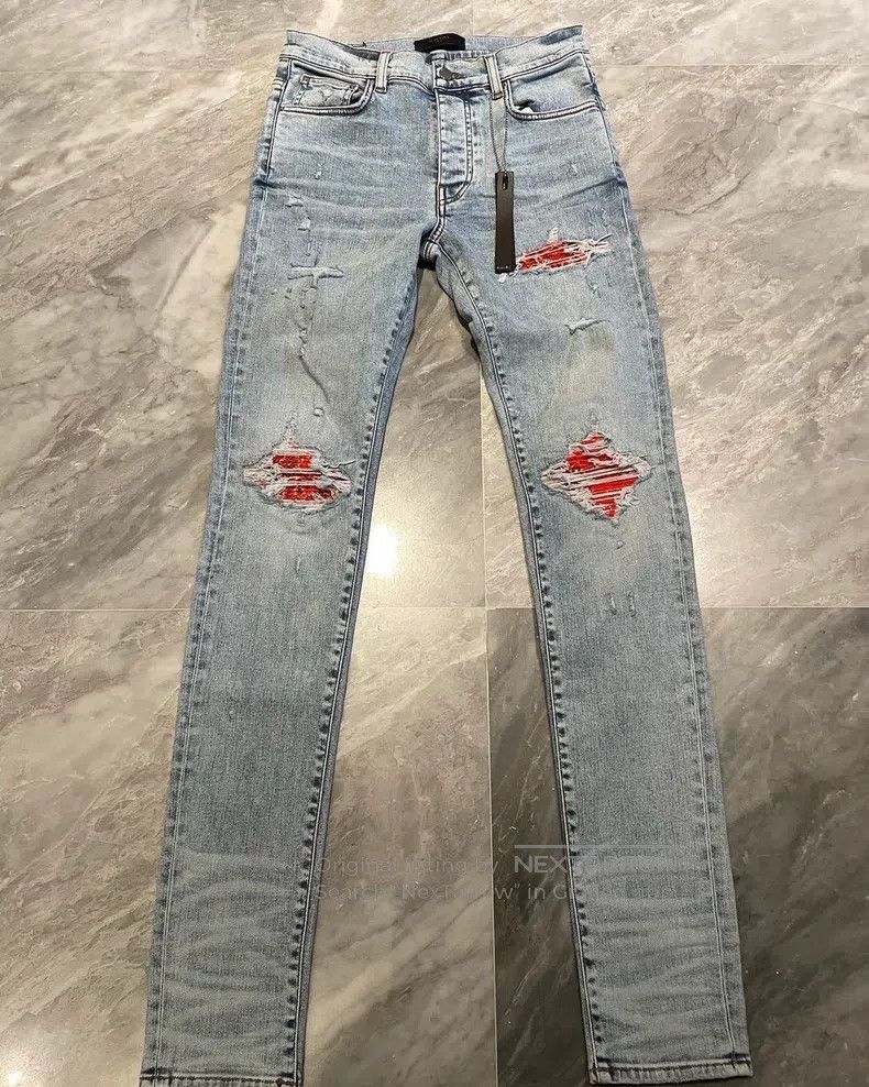 Amiri Size 31 Washed blue orange cashew flower patchwork MX