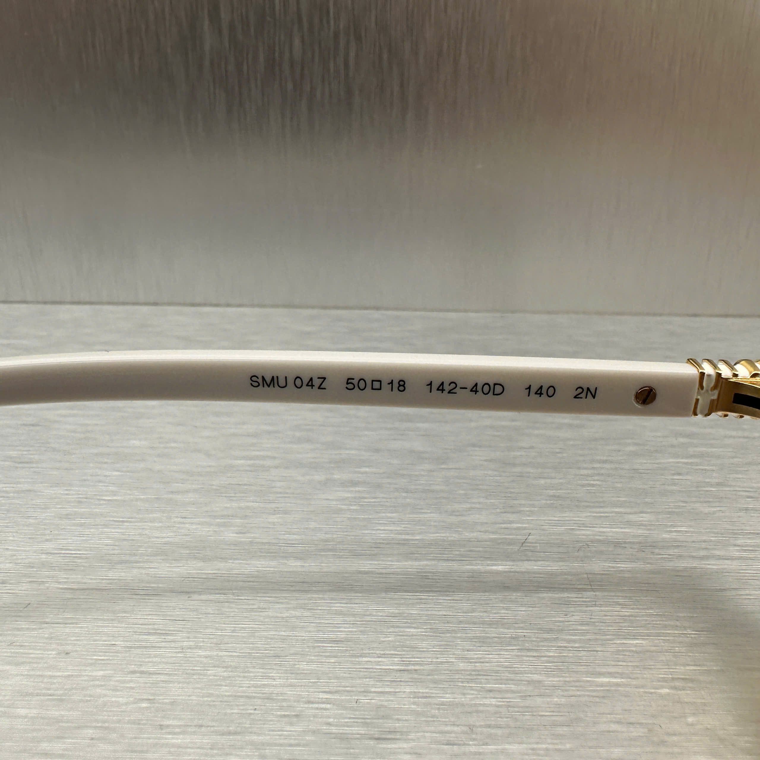 Miu Miu MIU MIU MU 04ZS 14240D Eyewear WHITE Size ONE SIZE - 10 Thumbnail