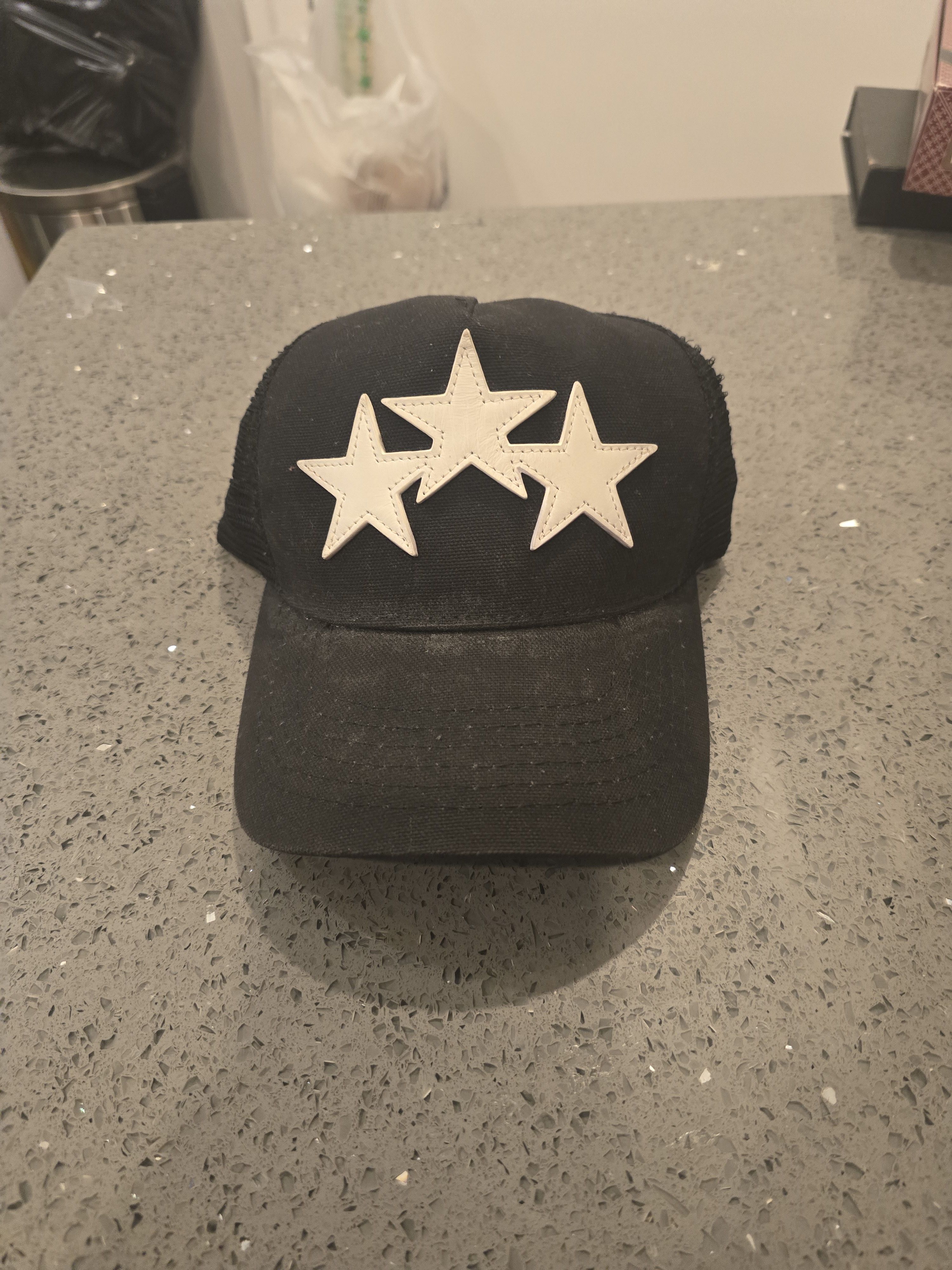 image of Amiri Three Star Trucker Snapback Cap in Black White, Men's
