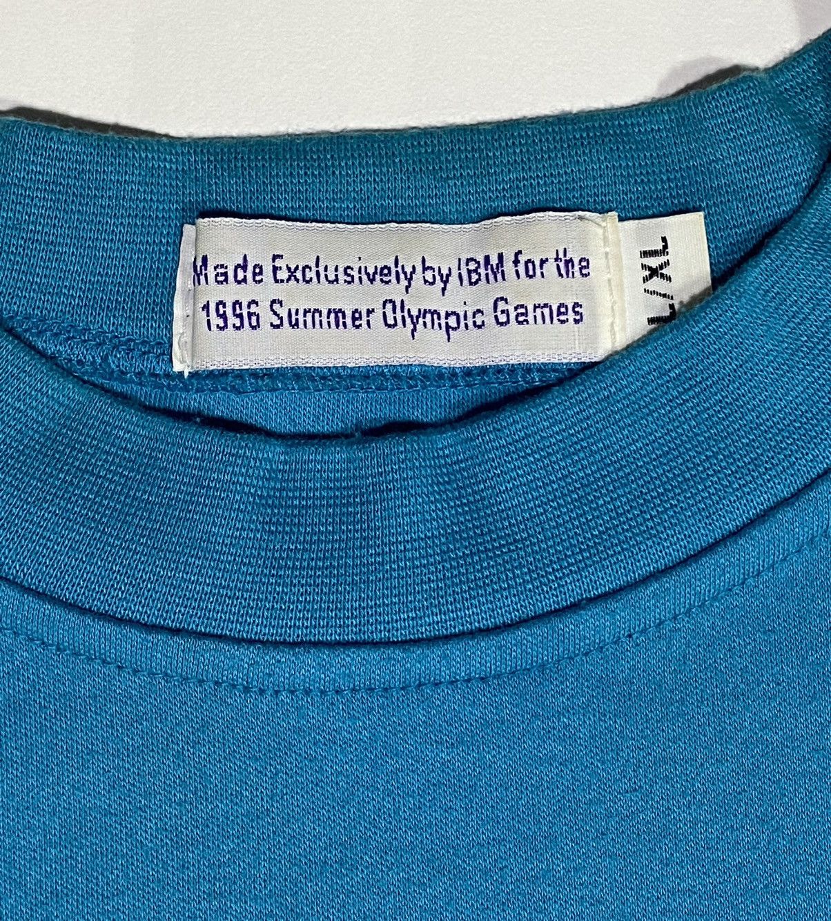 USA Olympics × Vintage Atlanta 96 Olympics IBM Sponsor T-shirt (Size XL ) Size US XL / EU 56 / 4 - 7 Thumbnail