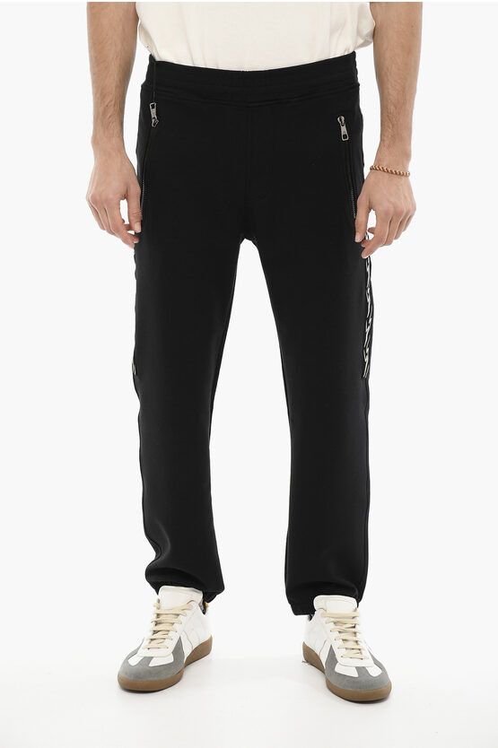 image of Neil Barrett Skinny Fit Joggers With Side Thunderbolts Print in Black, Men's (Size 30)