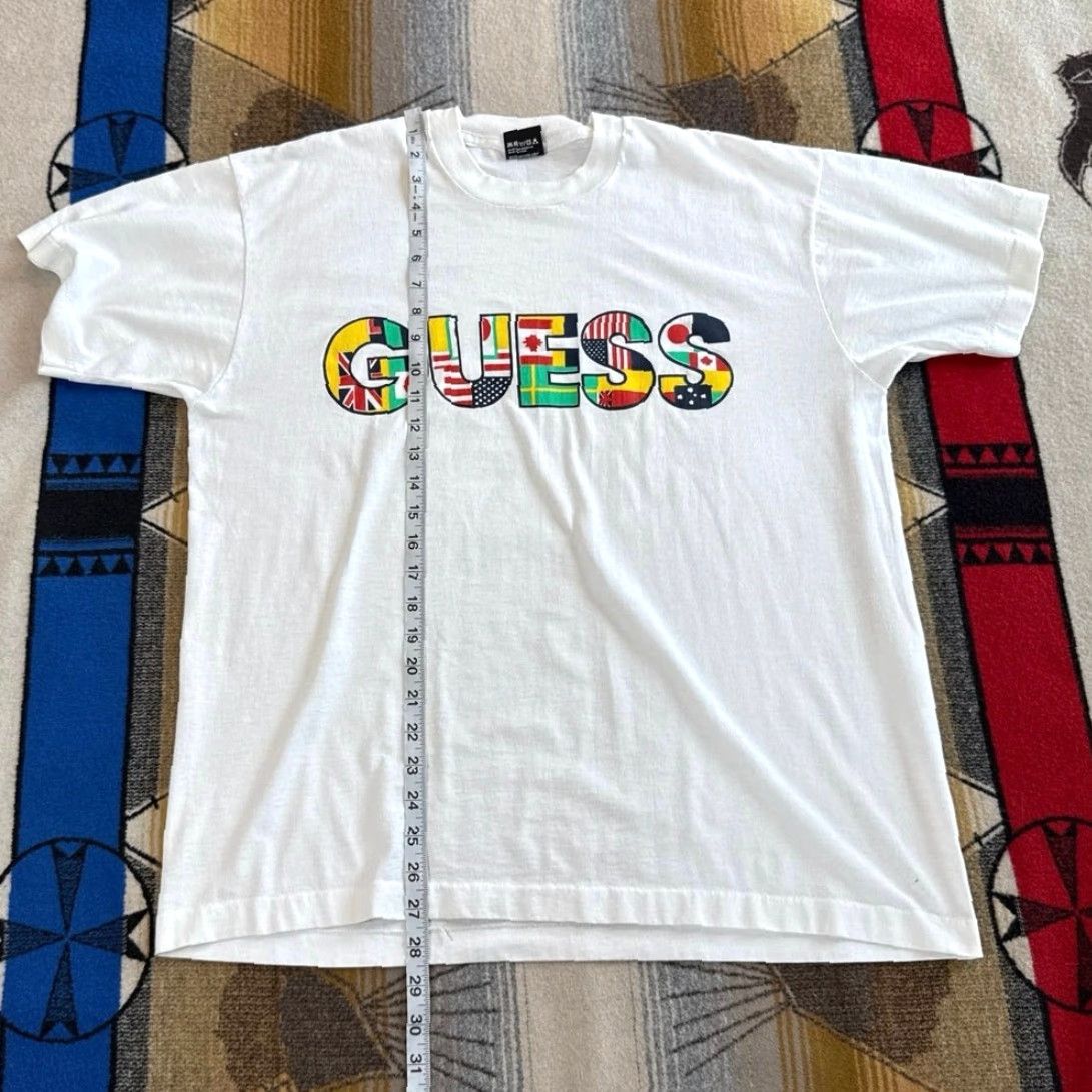 Vintage VINTAGE Guess Nations Flags T-Shirt Large Men 90s White Short Sleeve World Flags 1990s Size US L / EU 52-54 / 3 - 5 Thumbnail