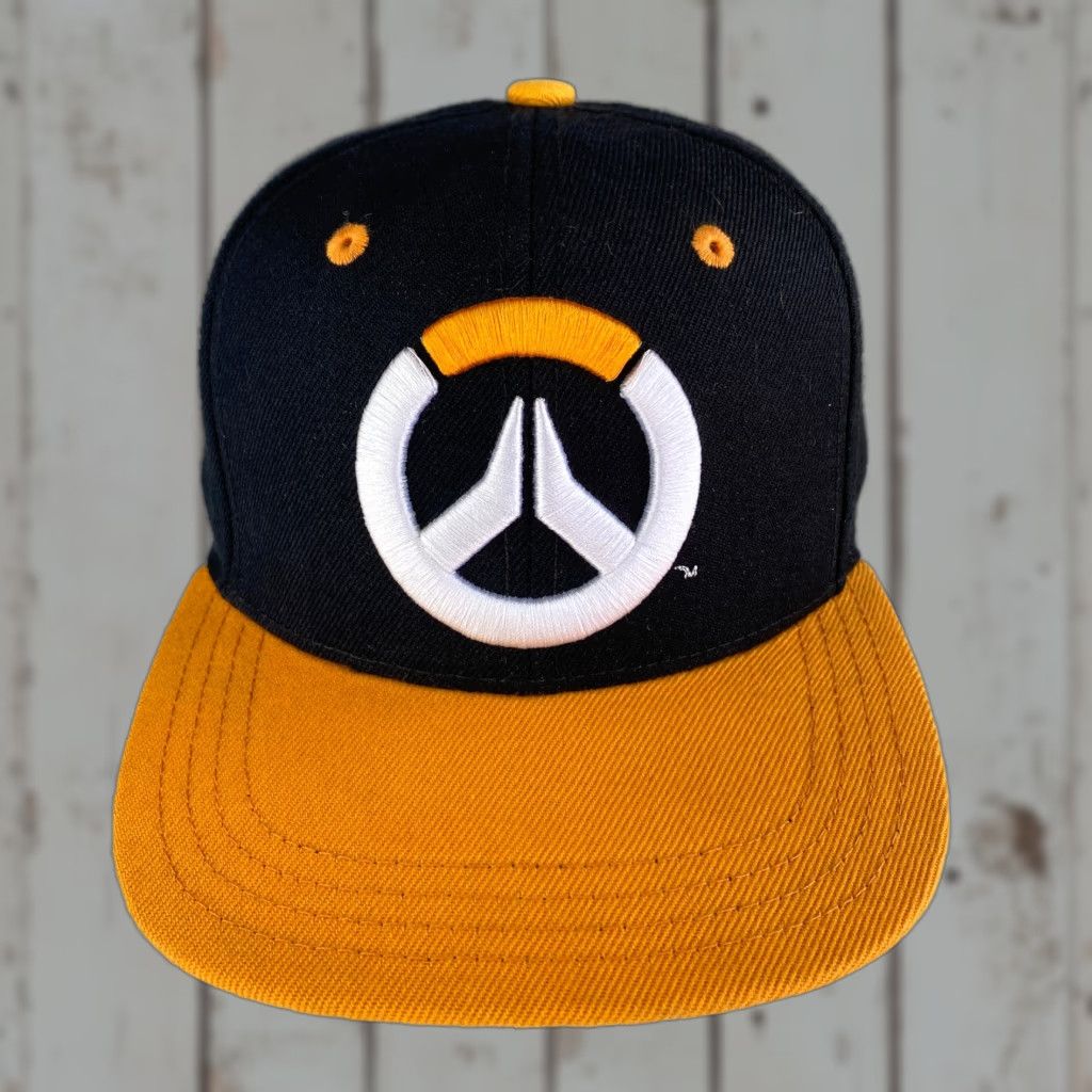 Vintage Jinx/ThinkGeek Overwatch Game Snapback Hat Black Yellow Embroidered Official Unisex Adults One Size Adjustable Breathable Canvas Cotton Polyester Hat Size ONE SIZE - 1 Thumbnail