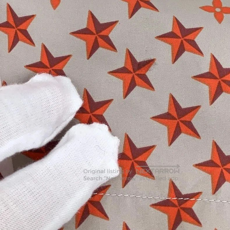 Louis Vuitton Pink Logo Star Print Shorts.