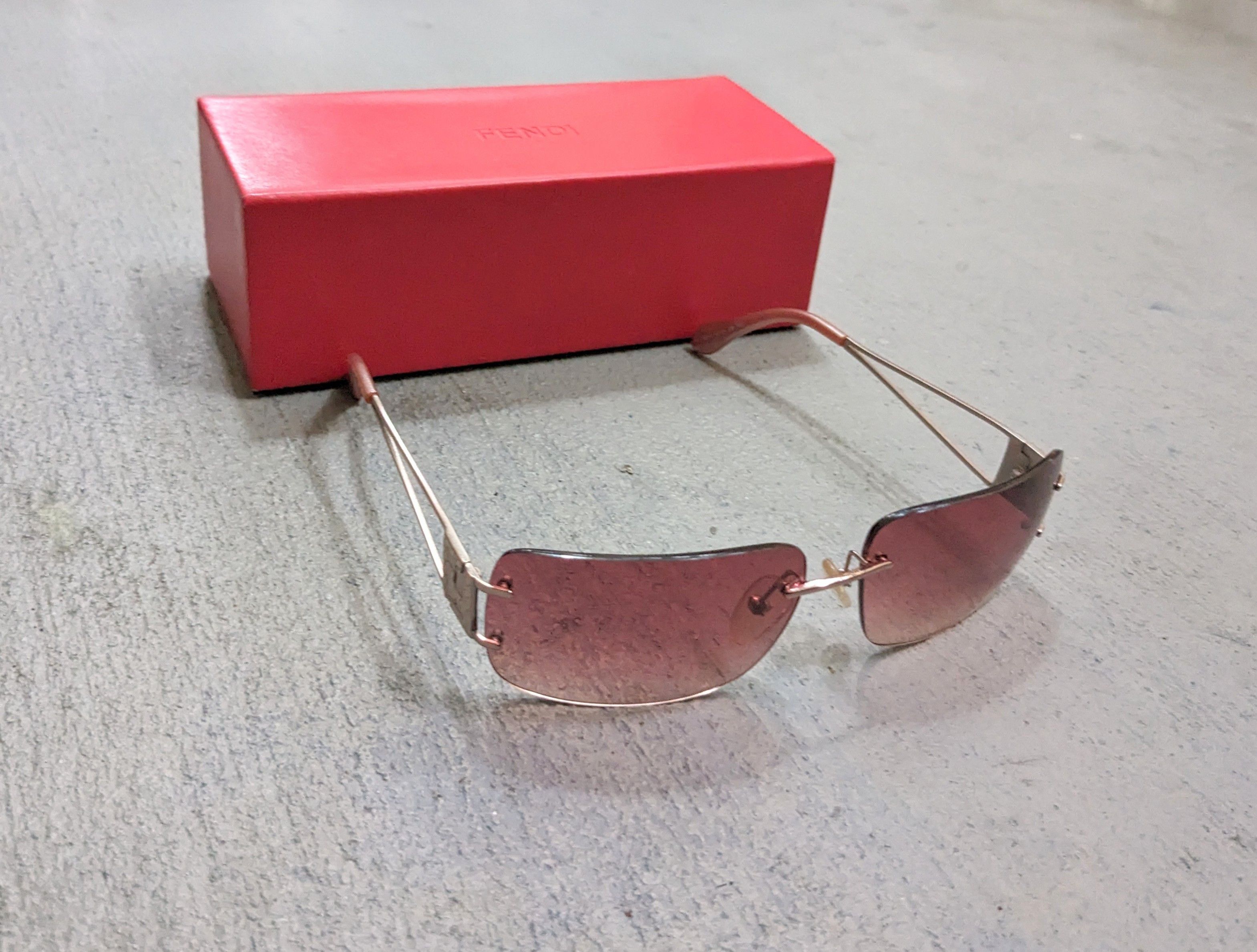 image of Fendi Sunglasses Fs 416 Pink Gradient Rimless Frameless, Men's
