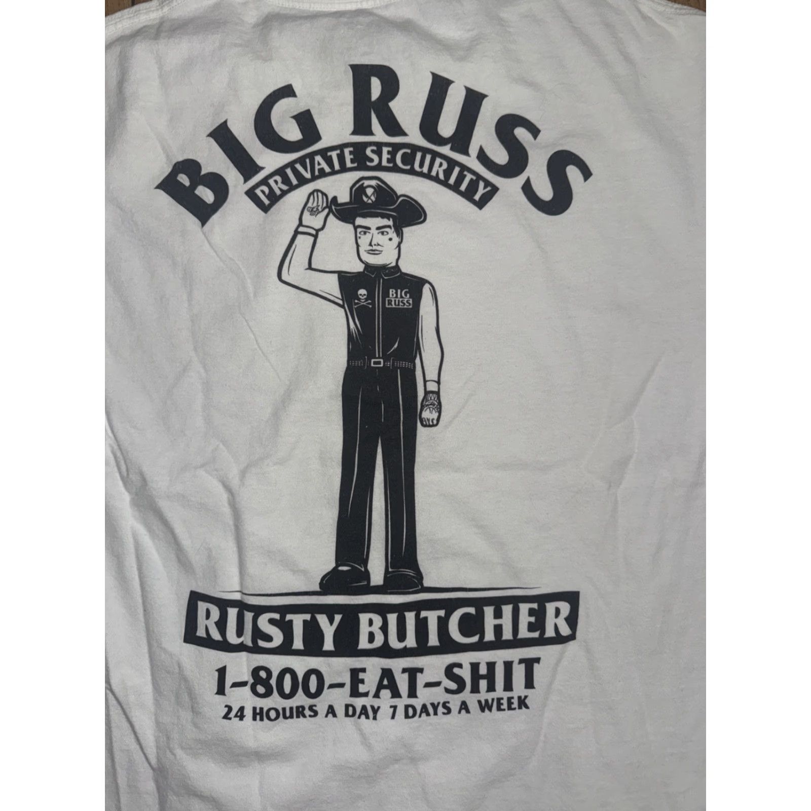 Rusty Rusty Butcher T-Shirt White Large 20x28 Motorcycle Mens Big Russ Private Security 1-800-EAT-SH*T Size US L / EU 52-54 / 3 - 2 Thumbnail