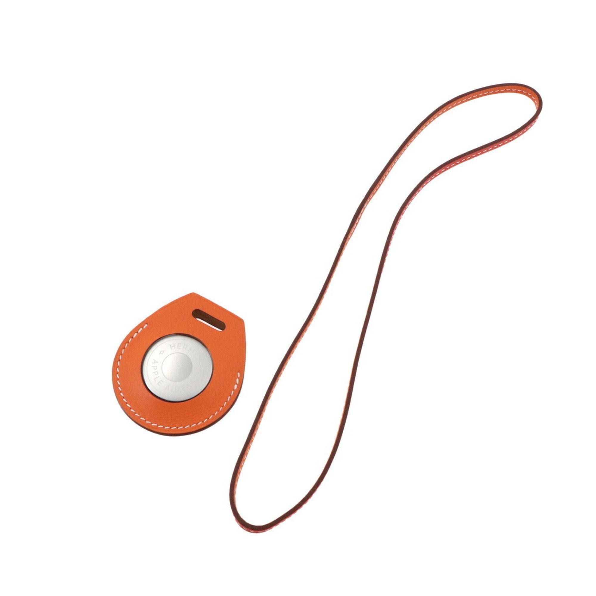 image of Hermes Apple Airtag Bag Charm Swift Orange Gold Capucines Z Engraved in Brown, Women's