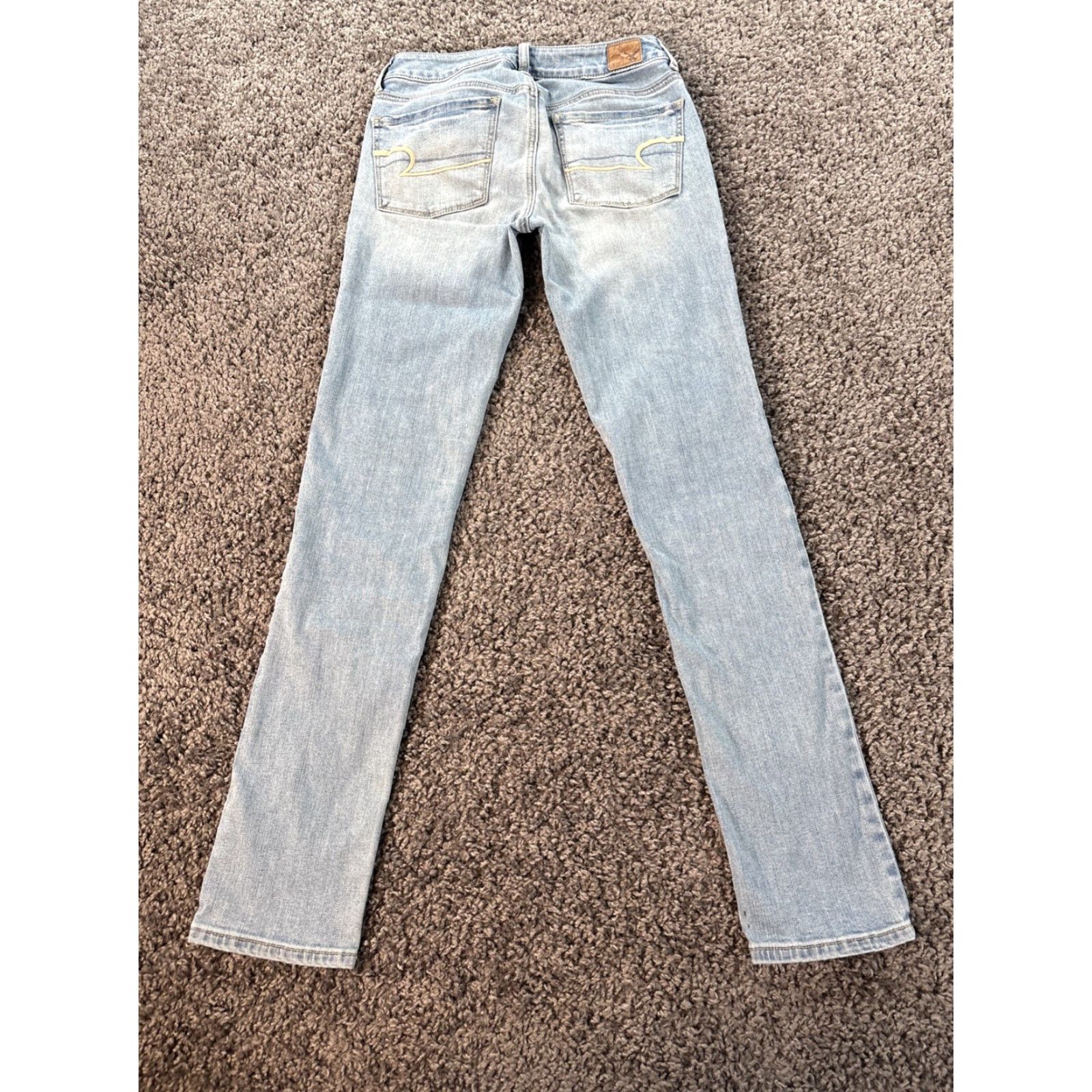 American Eagle Outfitters American Eagle Jeans Skinny Womens 4 28x30 Blue Distressed Low Rise Light Wash Denim Pockets 28 Inseam Regular Slim Jeans Women Size 27" / US 4 / IT 40 - 7 Thumbnail