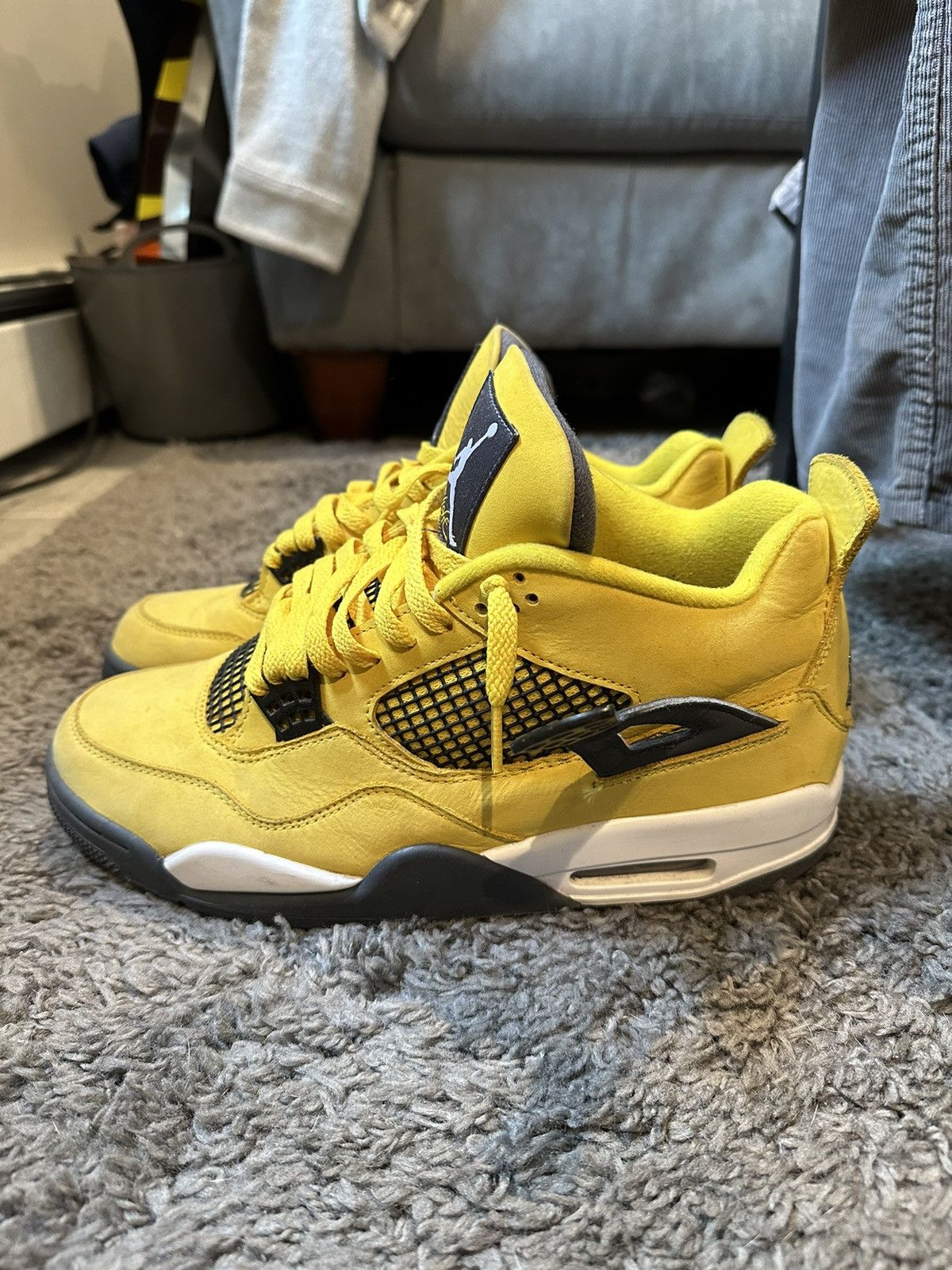image of Jordan Brand 4 Lightning Shoes in Yellow, Men's (Size 10.5)