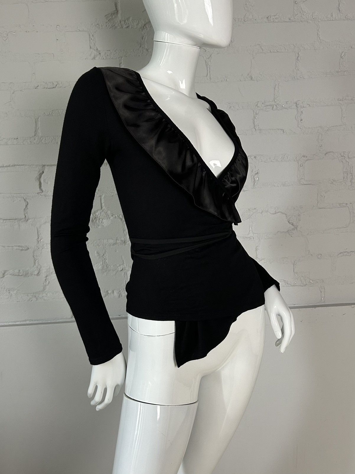 Black ruffled long sleeve top